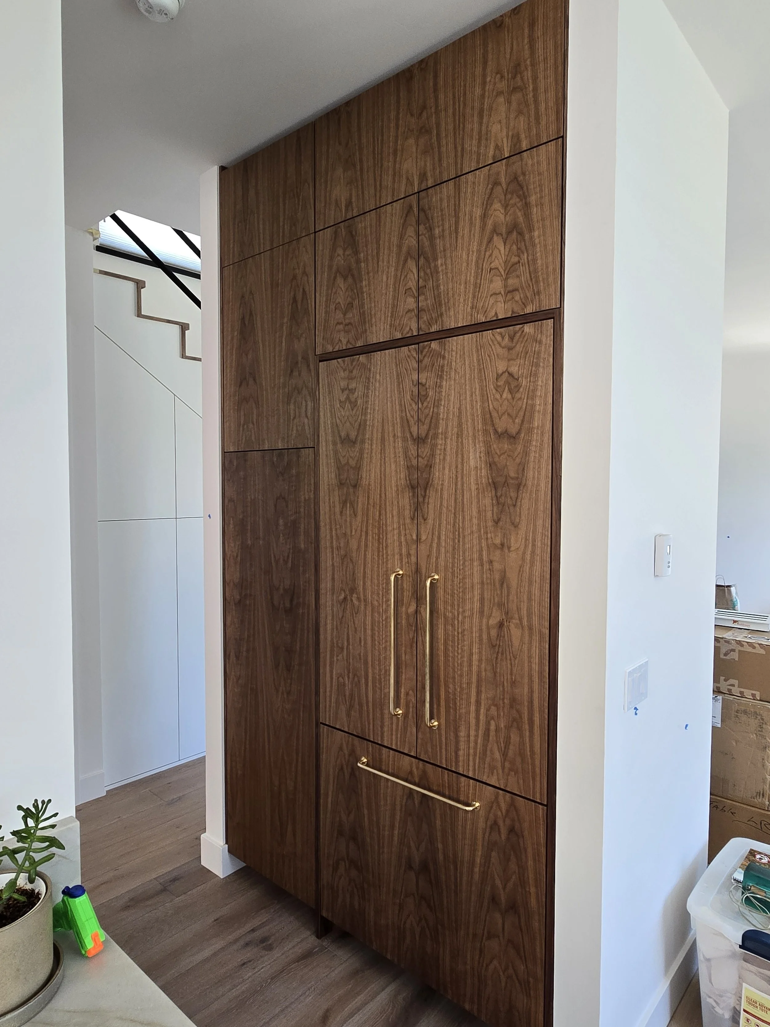 Custom Panel Ready Fridge with Matching Cabinet Surround