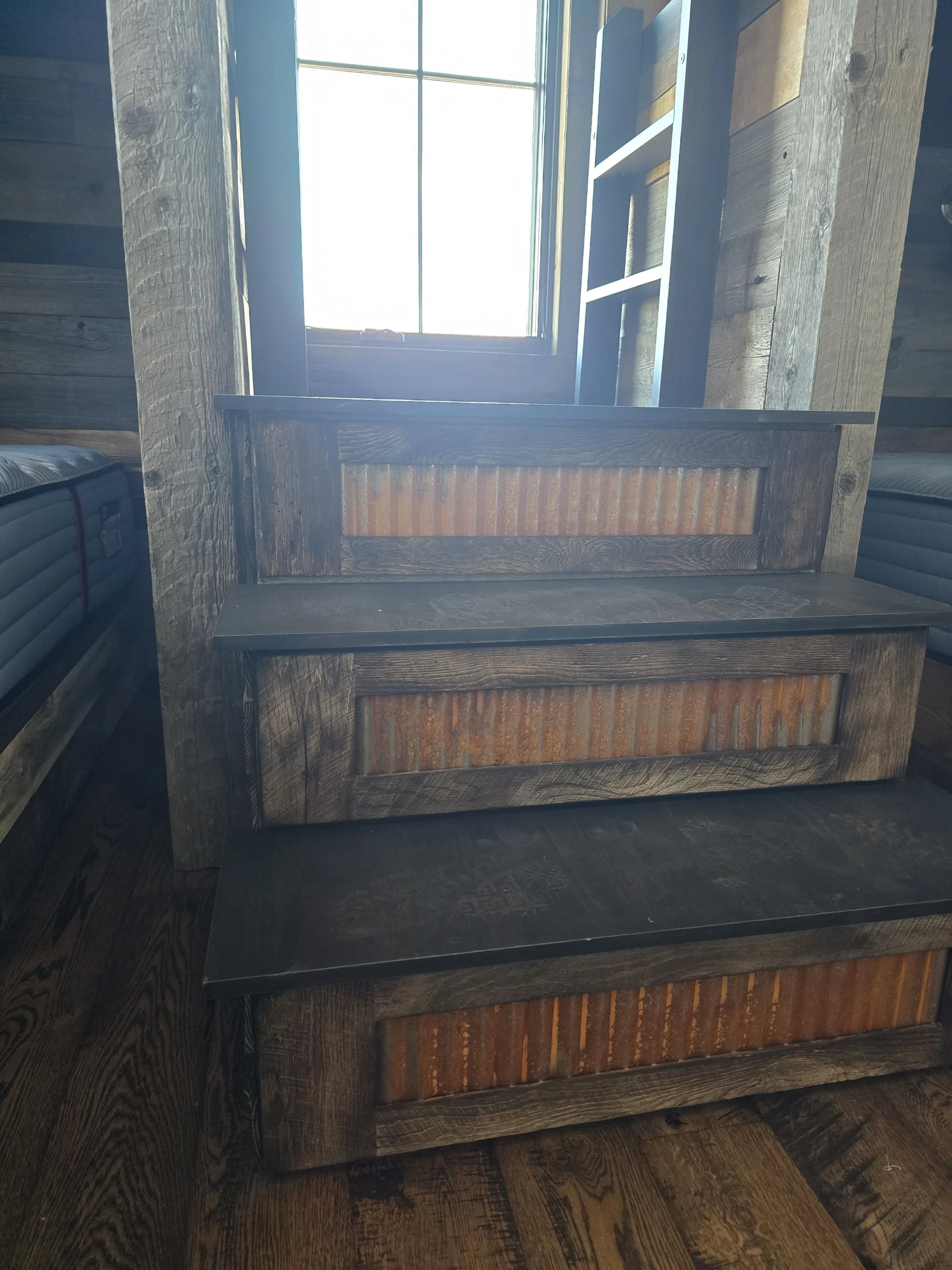 Reclaimed wood bunk bed stairs and ladder detail—handcrafted ACW project combining rustic materials with safe, practical access to upper bunks.