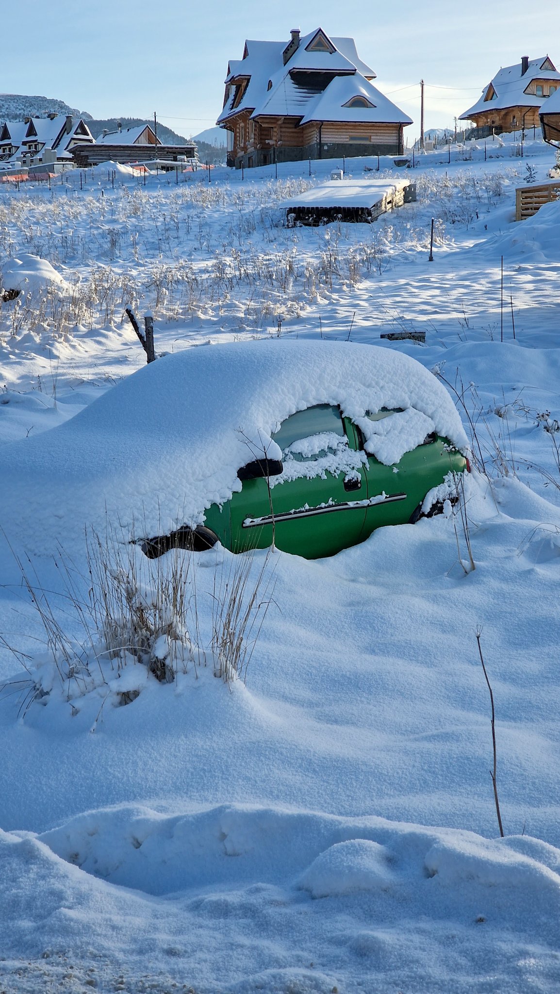 Car covered in snow zakopane