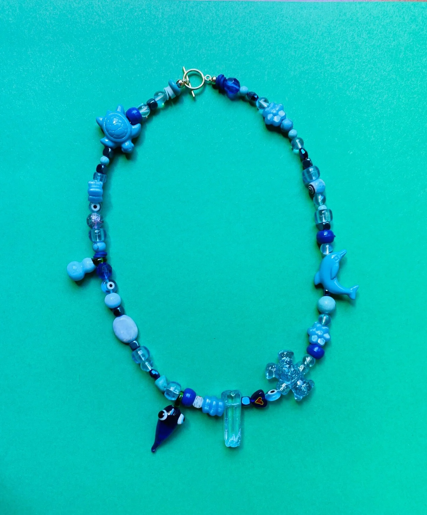 All Blue on a wire with Gold fill Toggle Clasp