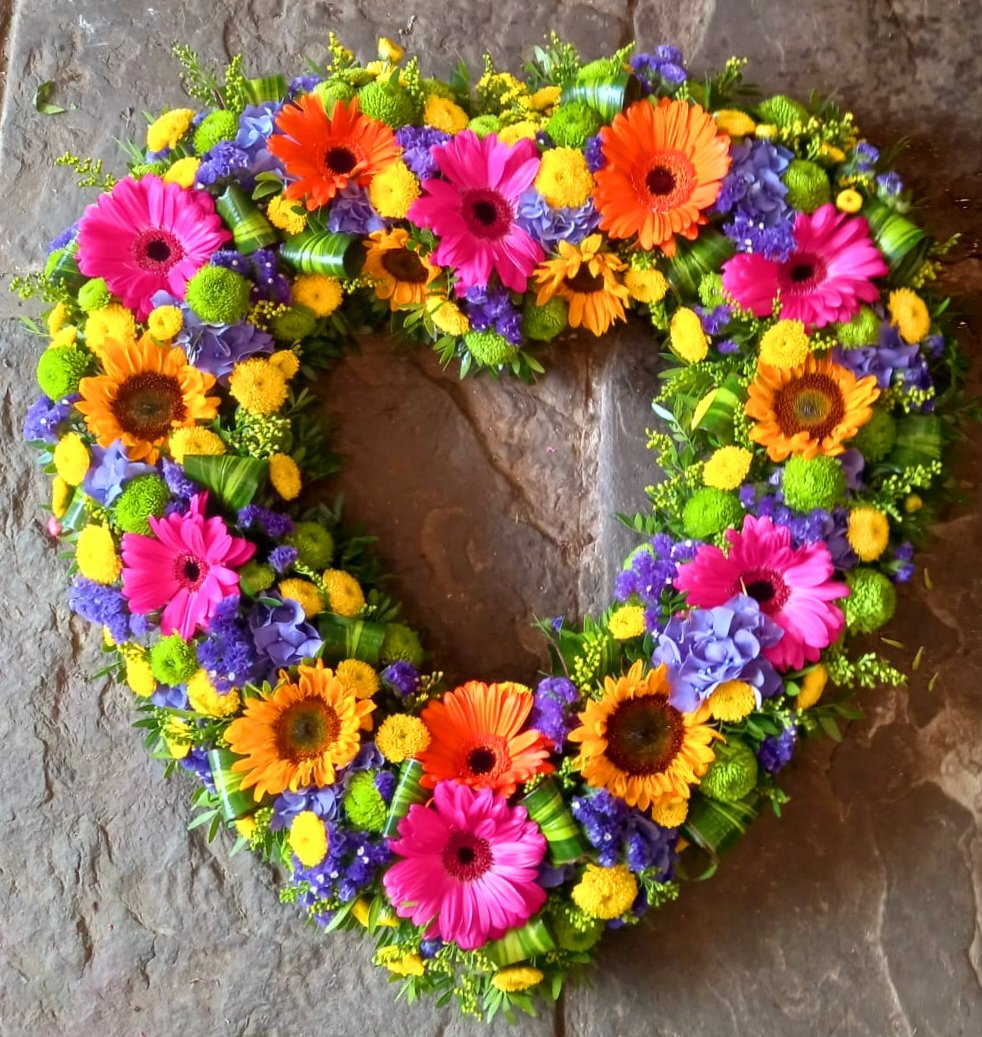 All The Bright Colors Heart Shaped Tribute Wreath