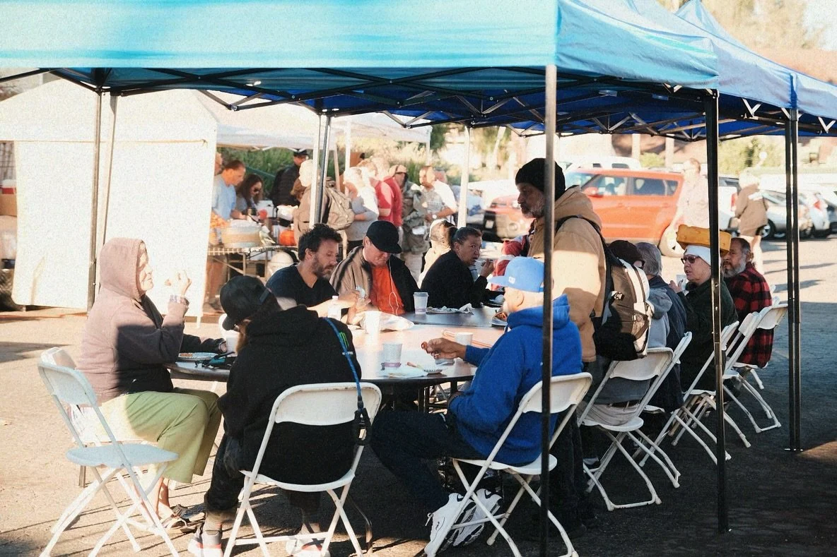 Serving a hot meal on a cold morning. Humanity Showers at All Saints Episcopal Church. Located at 651 Eucalyptus Ave in Vista CA, across from the Vista Civic Center