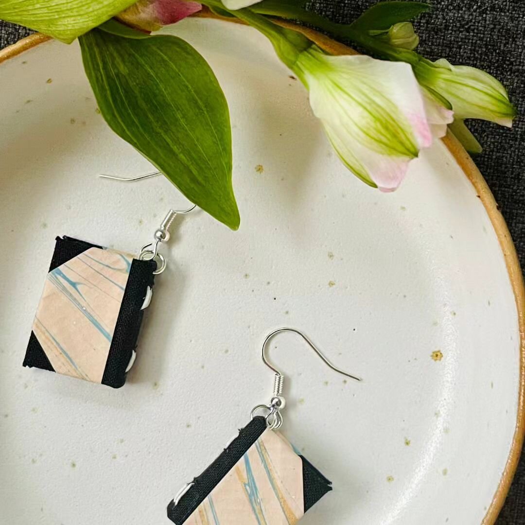 The obvious choice for early summer ✨

These powder marbled earrings have just landed in our webstore - with the most subtle streakes of light blue marble effect they work effortlessly with any outfit.

Match these little books with any book moment &