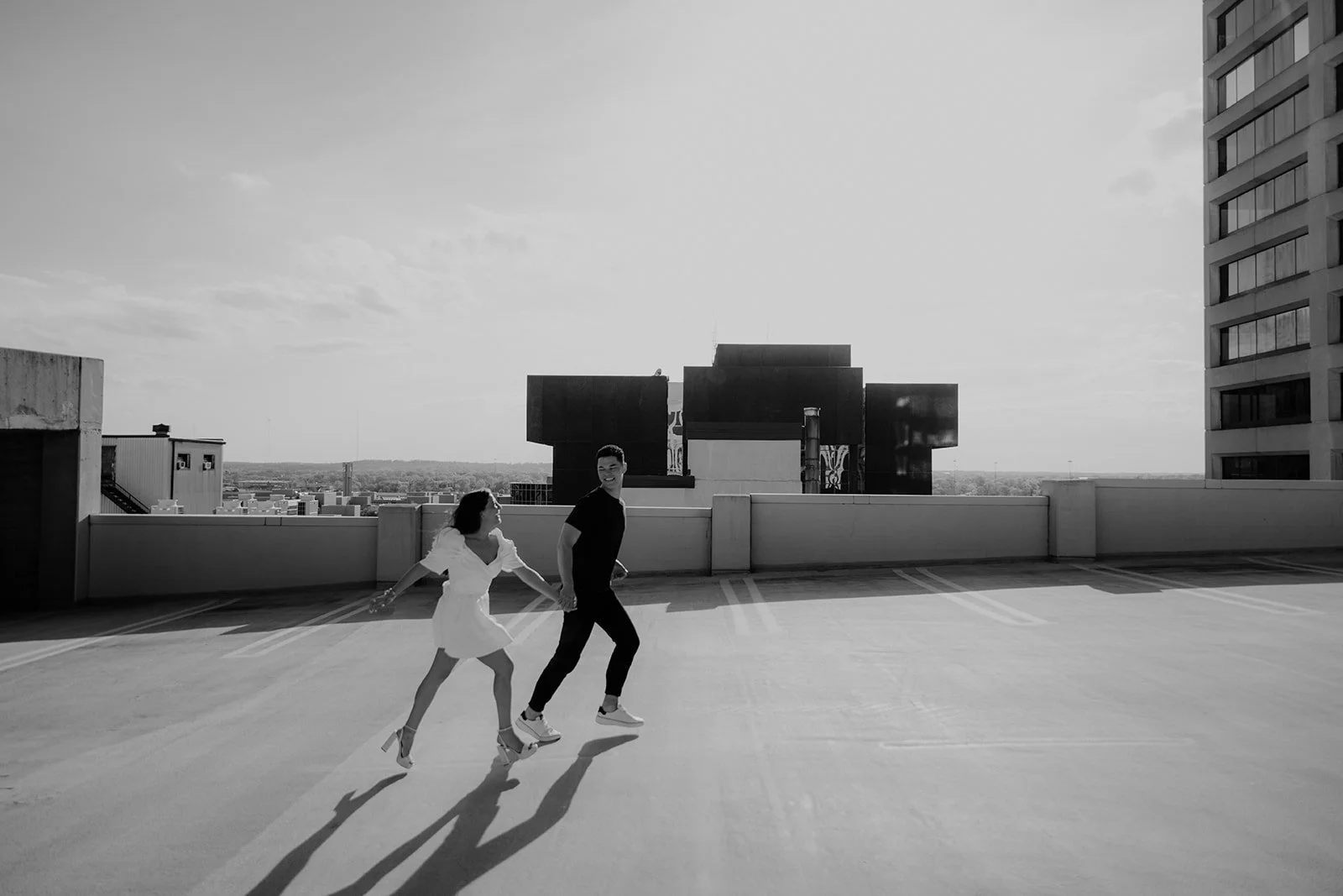 Adam + Anna Marie _ Dayton_Rooftop_Engagement_BlackMarbleMediaCo-292.jpg