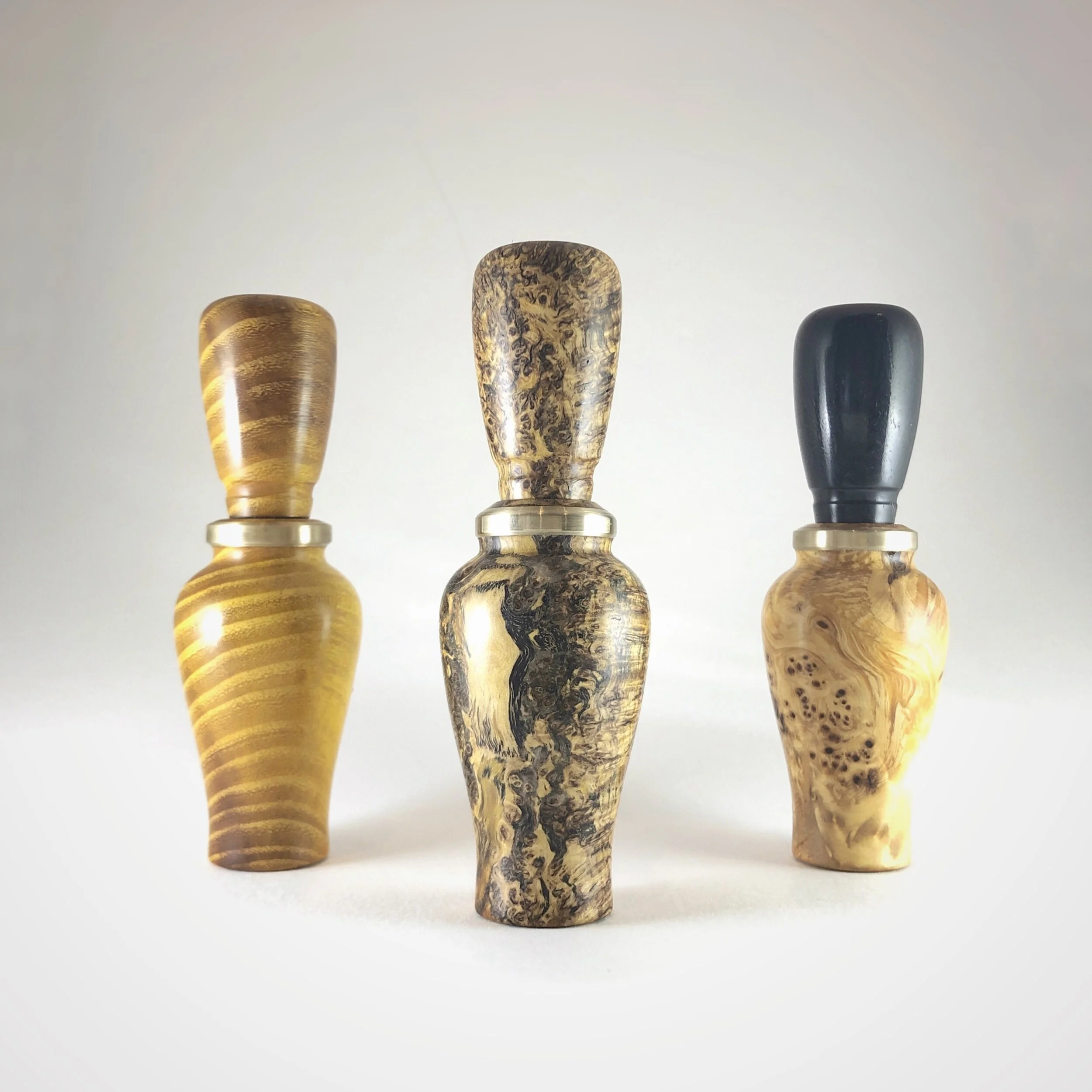 three custom duck calls