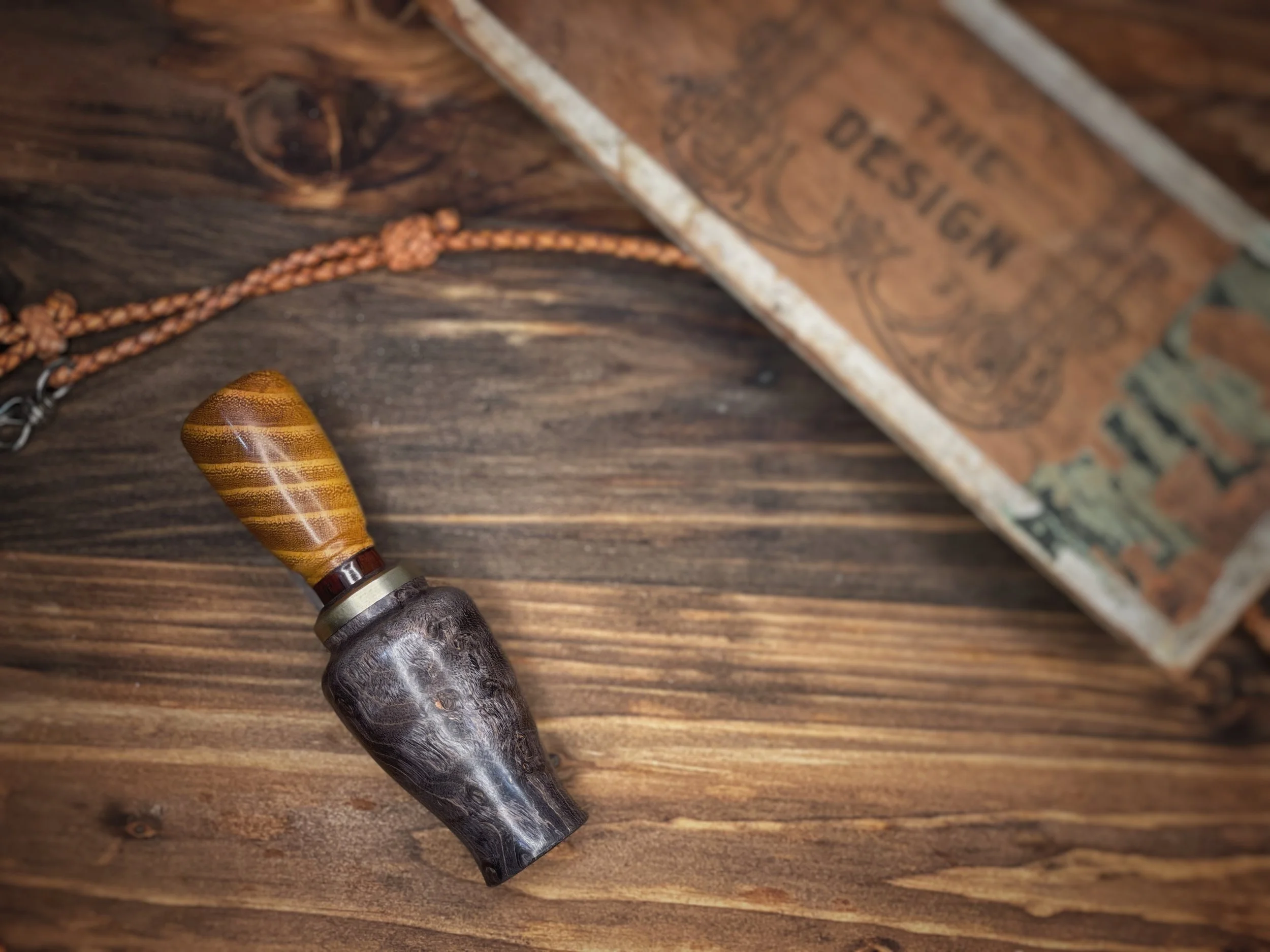 burl duck call barrel with a corosscut hedge insert