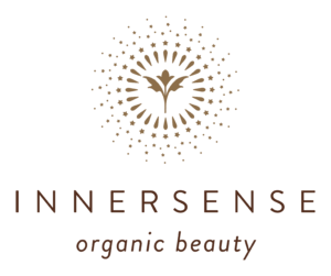 Innersense Organic Beauty logo with a stylized tree and circular decoration.