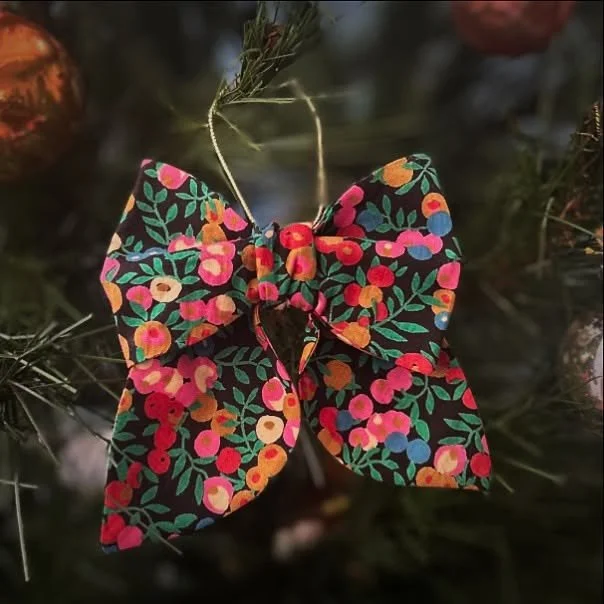 One of my current favourites is this vintage piece of Liberty &lsquo;Wiltshire&rsquo; sourced from the UK. The colours really pop on the dark background. 
Christmas bows are now available to purchase; and if you&rsquo;re looking for a specific print 