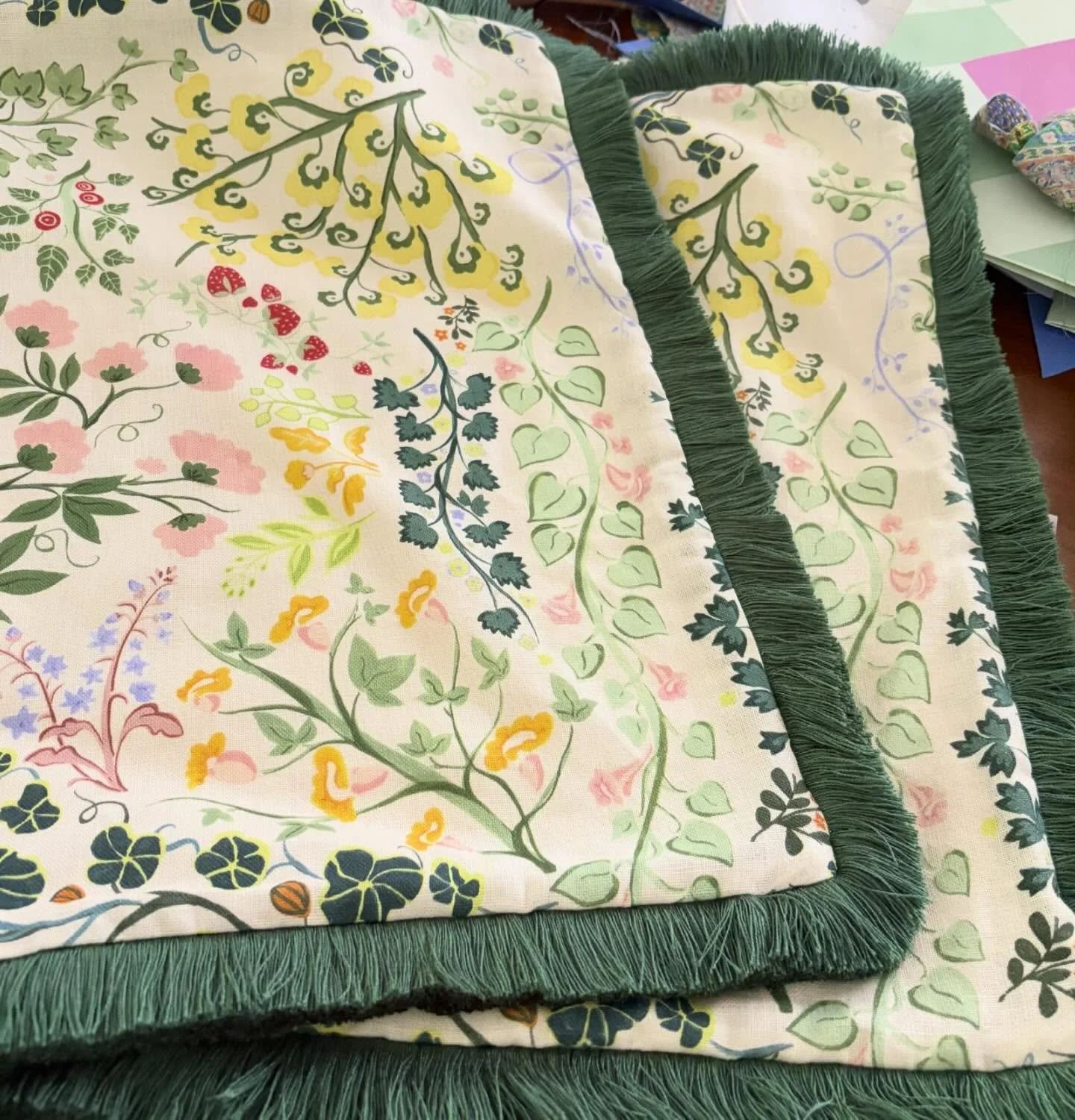 Terrible photo, but great cushion covers. 
I&rsquo;ve used @anna_spiro_textiles Summer Fields fabric with the perfect dark sage green fringe trim. One their way to another happy customer.