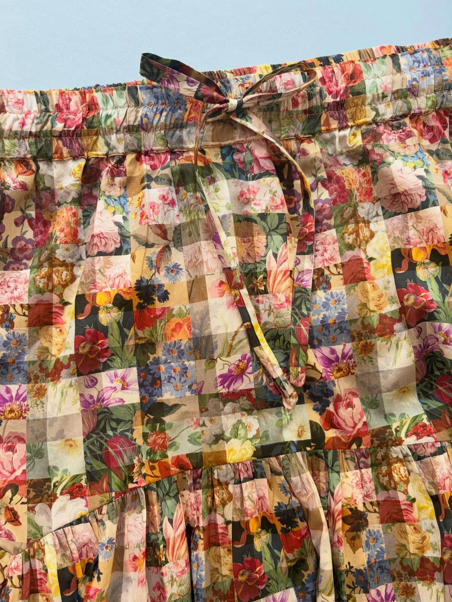 Did I already have a wardrobe full of Liberty dresses, blouses and skirts? YES 
Did I need to make a last minute skirt for today&rsquo;s Liberty Showcase? Also YES
I had a blouse made from &lsquo;Archive Gingham&rsquo; and always felt it needed a mat