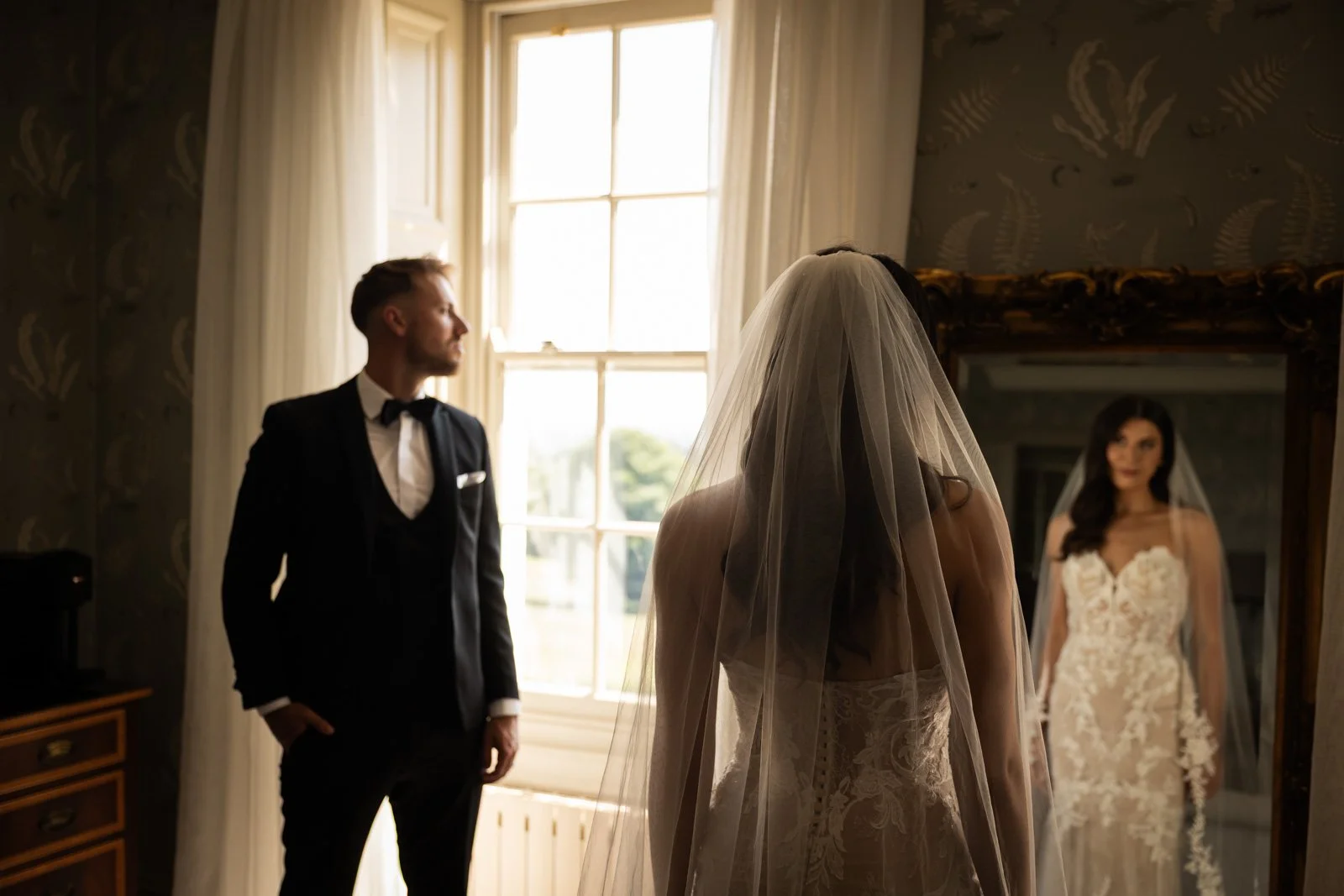 bride and groom in bridal suite in between wedding ceremony and marriage breakfast