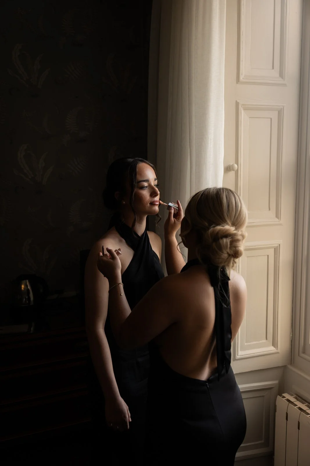 make up touch ups before wedding speeches in bridal suite at New House Country Hotel