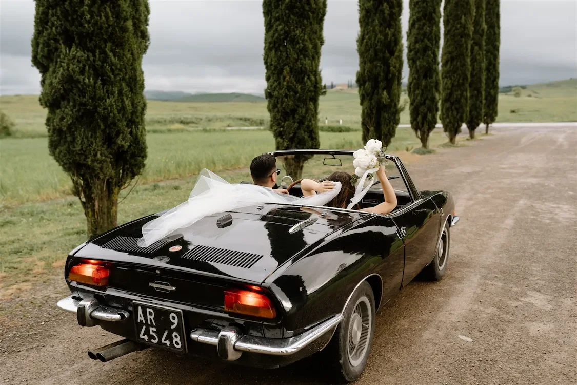 Elopement couple vintage car portrait in Europe - Somewhere Crazy