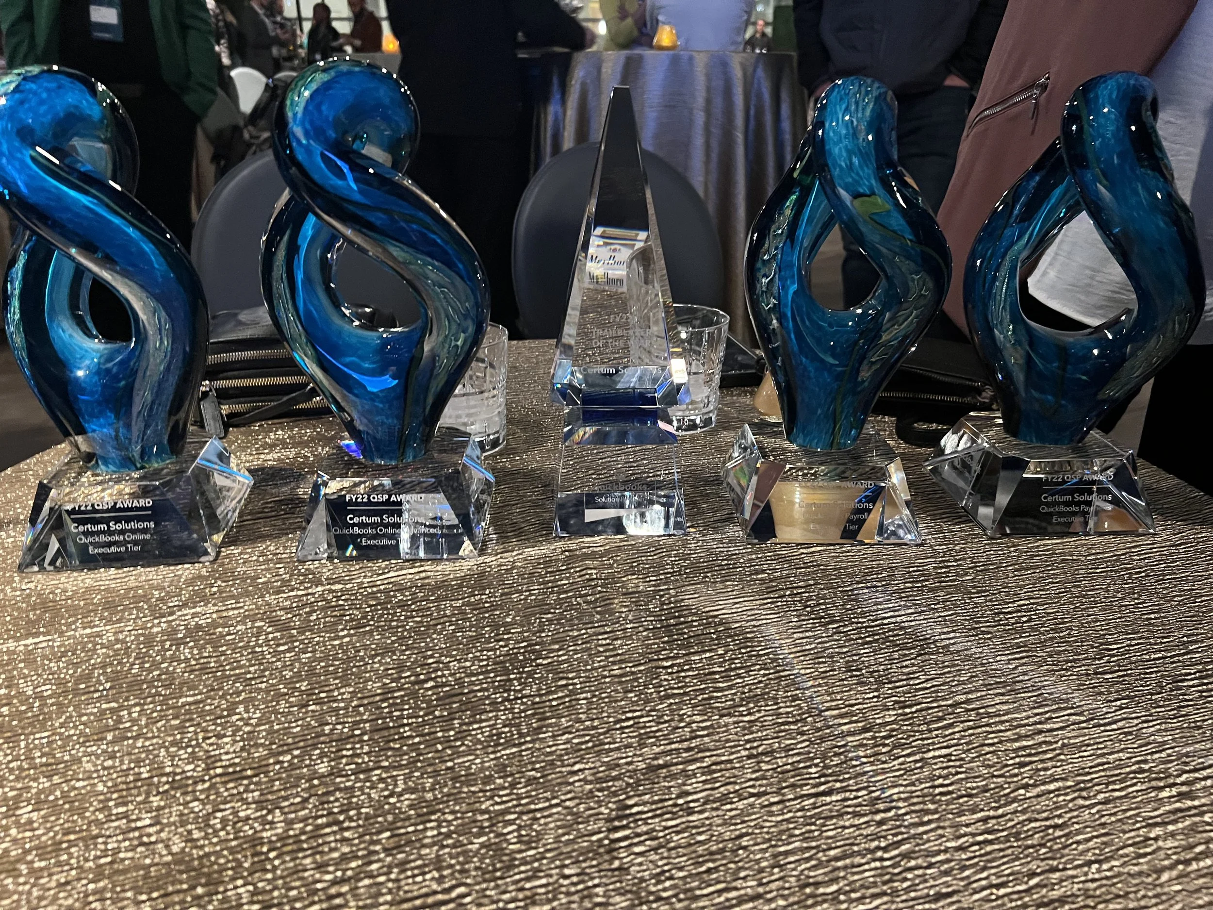 Awards, Katherine Bunschoten, President, and Leah Swain, VP Sales, in background