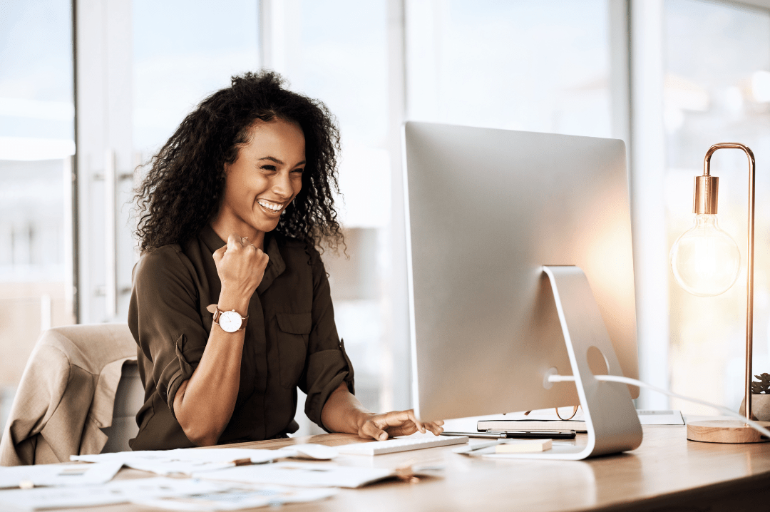 Senior accountant working at computer handling accounting for clients