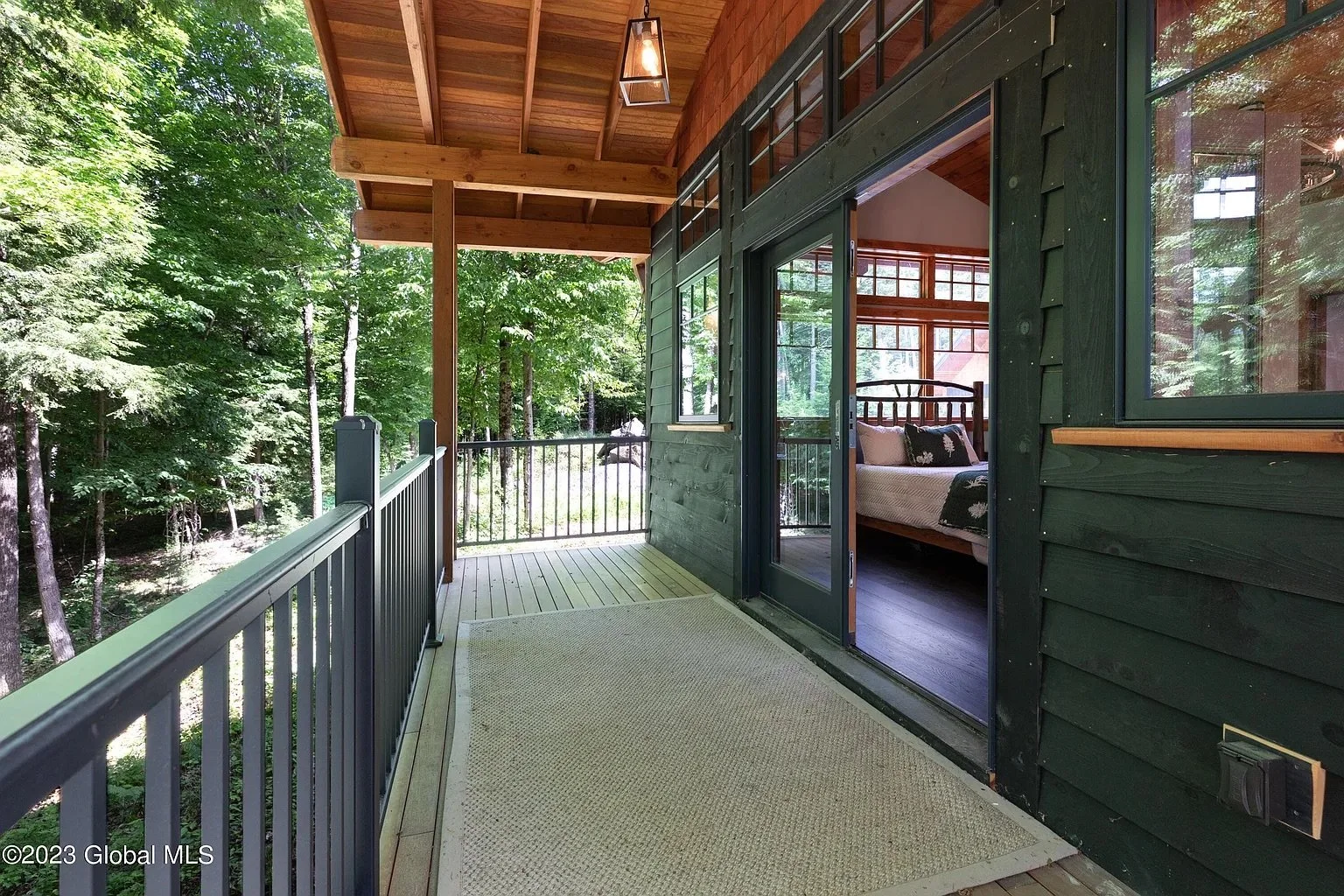 the woods  deck off of bedroom.jpeg