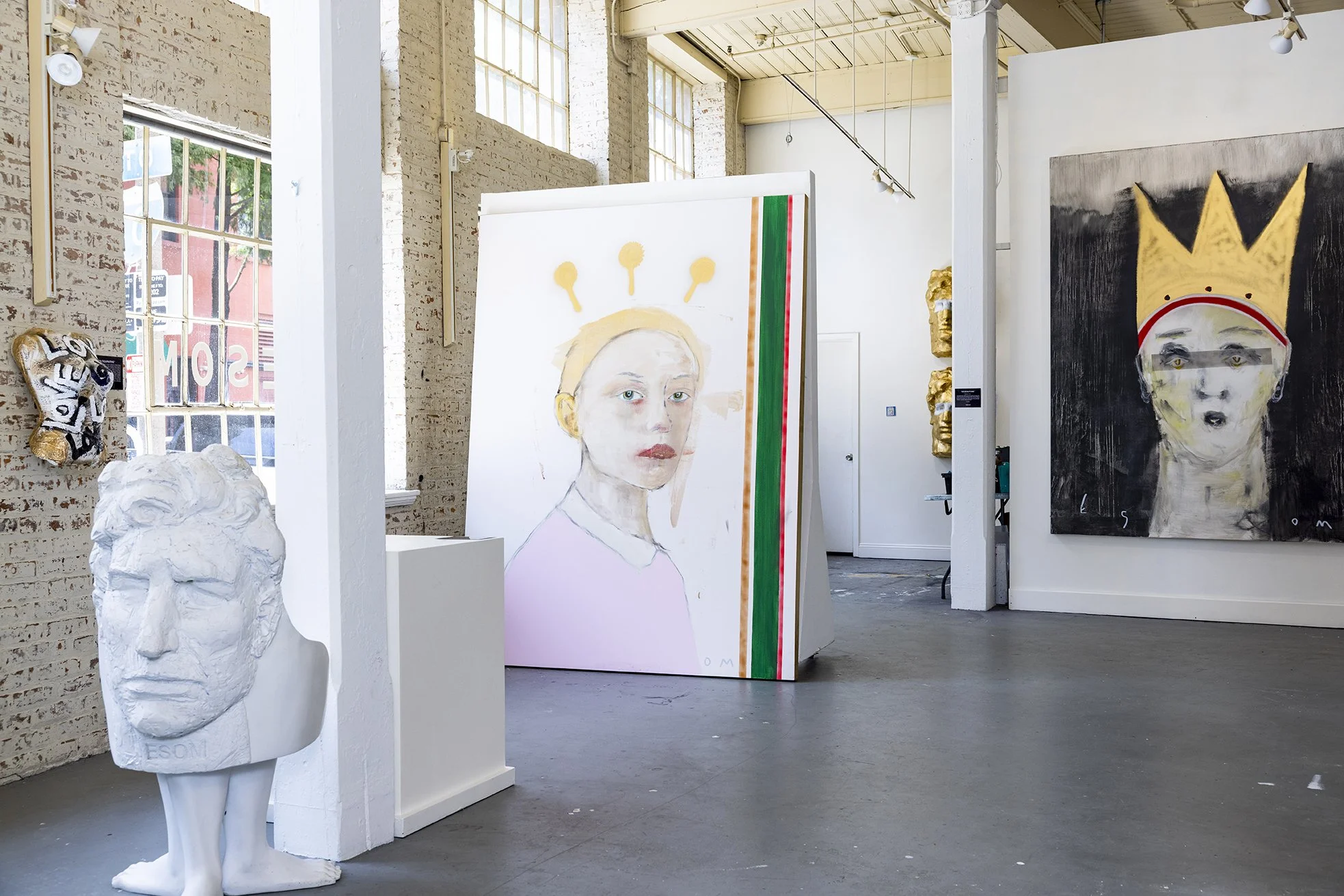 ESOM Art Julia Street Gallery interior with figurative paintings and sculptures