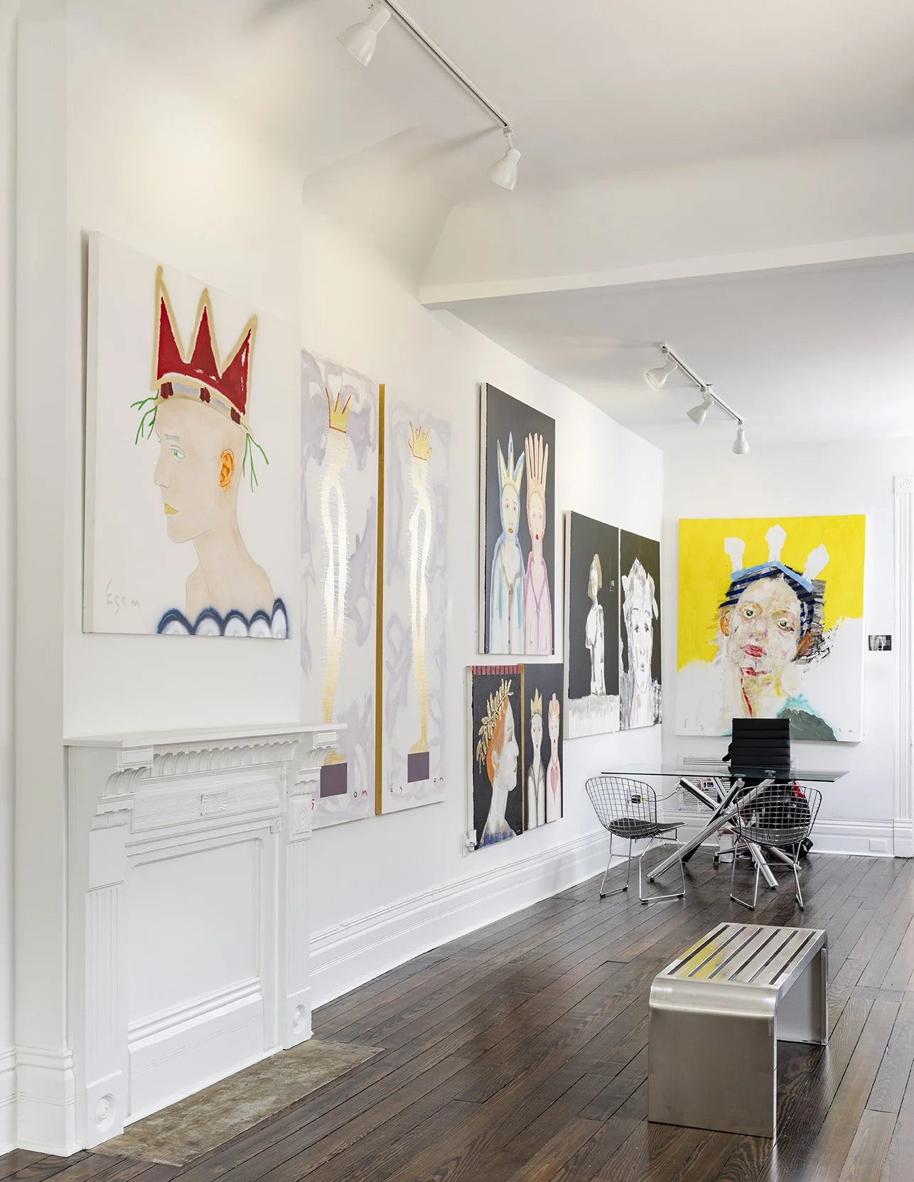 ESOM Art Gallery on Magazine Street interior with figurative contemporary paintings and desk