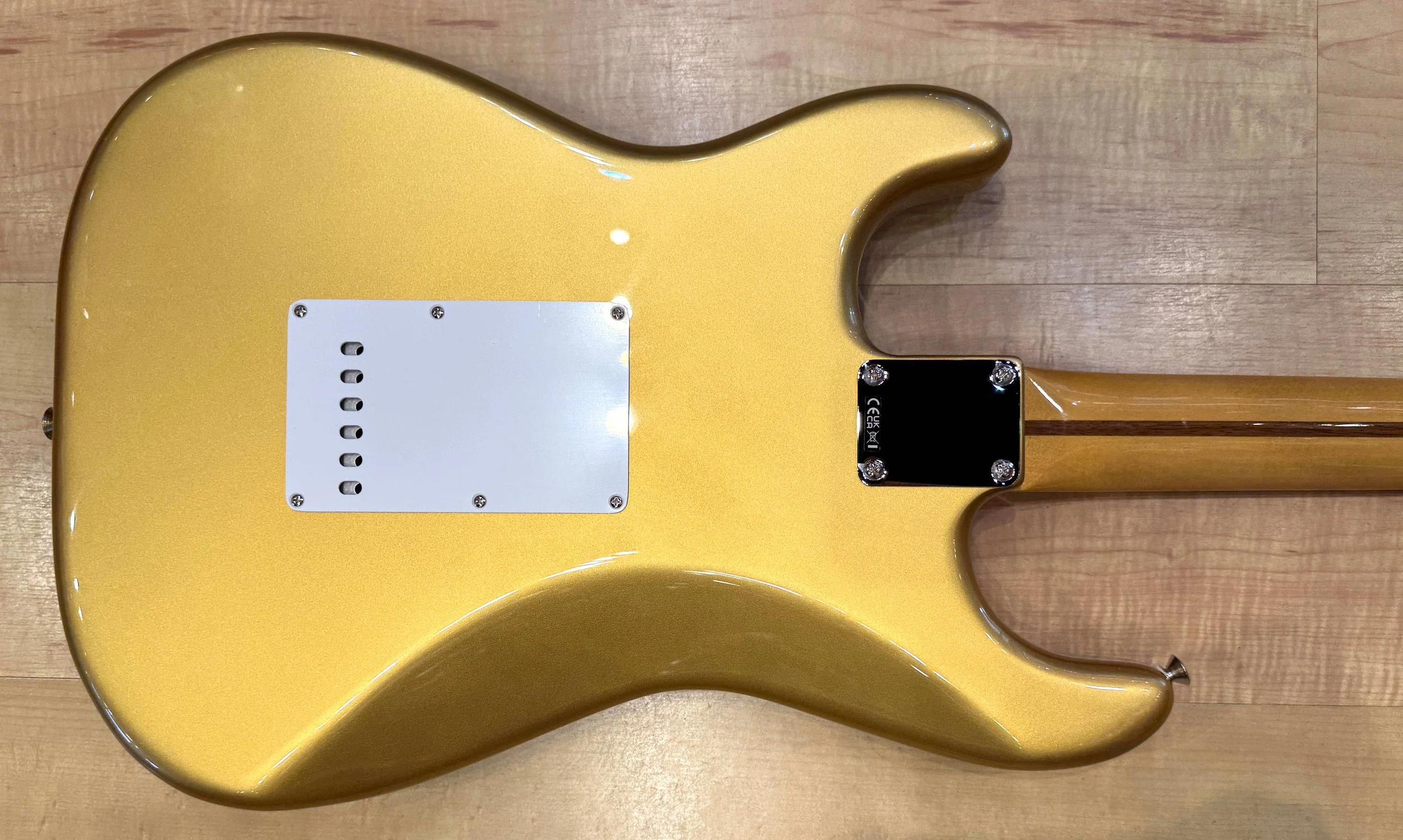 Back of the body of the Fender Vintera III Late '50s Stratocaster Electric Guitar In Aztec Gold