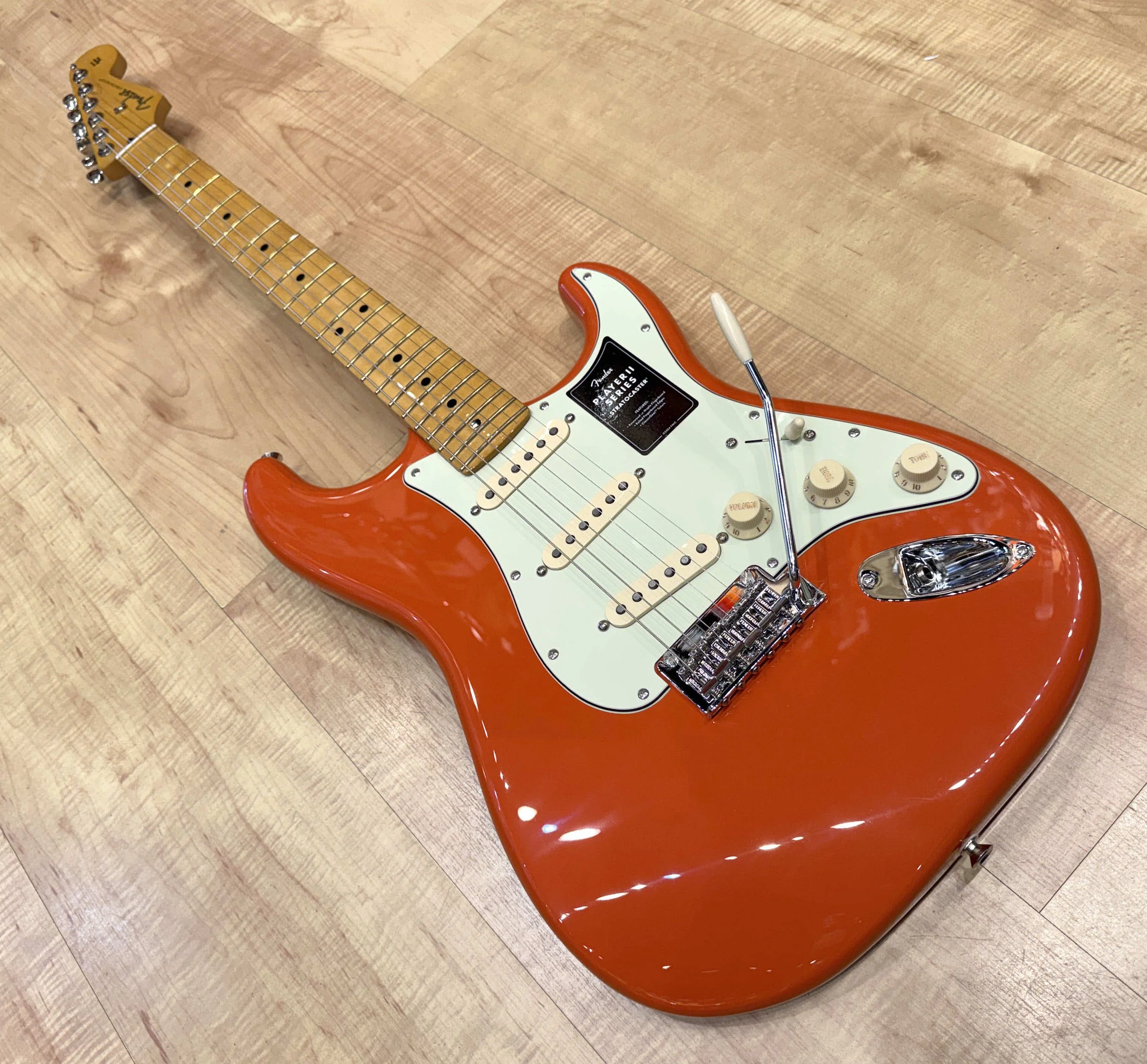 Bottom of the Fender Player II Stratocaster Electric Guitar In Rallye Orange