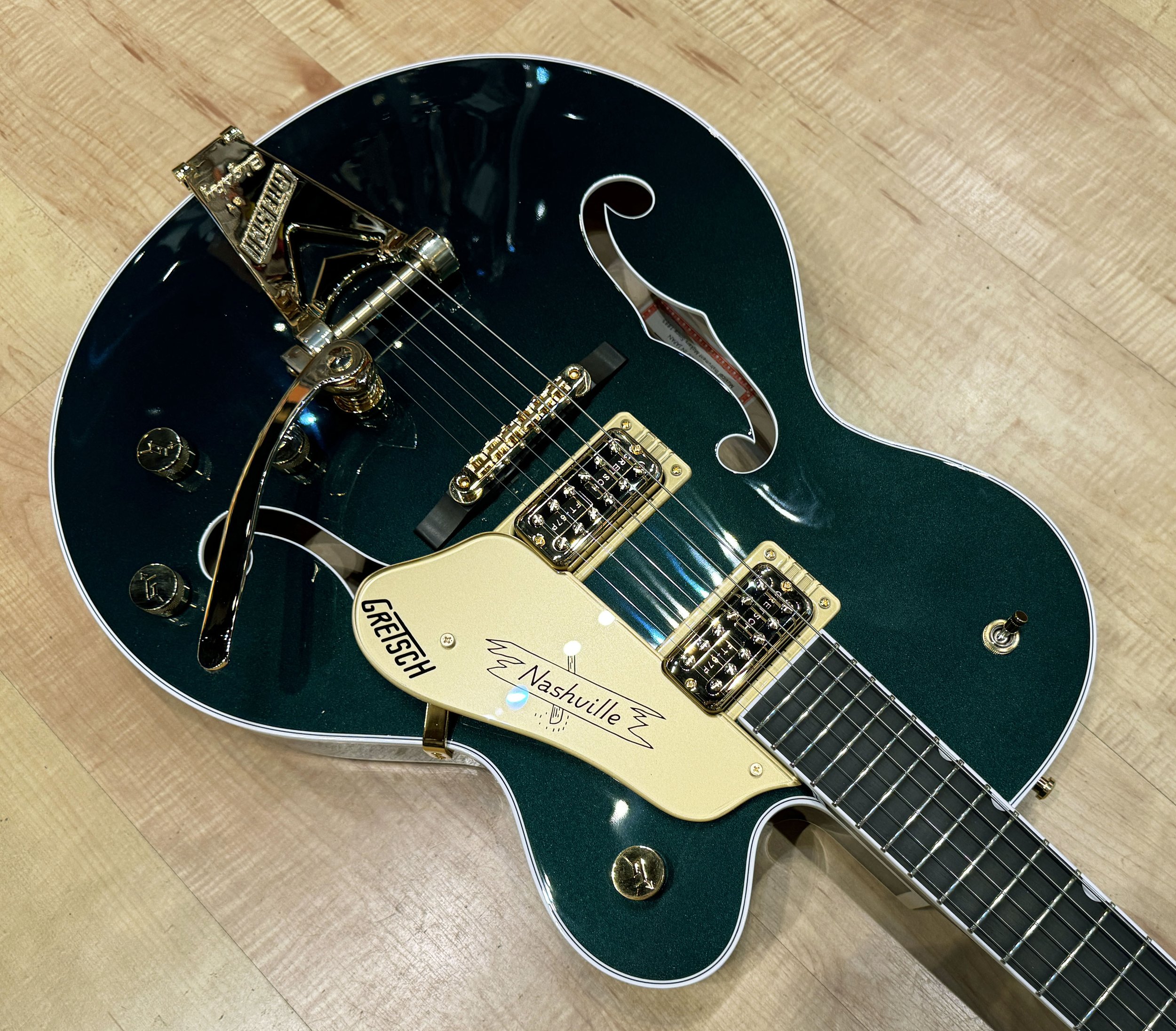 Strings of the The Factory Prototype Gretsch G6120TG Players Edition Nashville Hollow Body with Bigsby and Gold Hardware In Cadillac Green