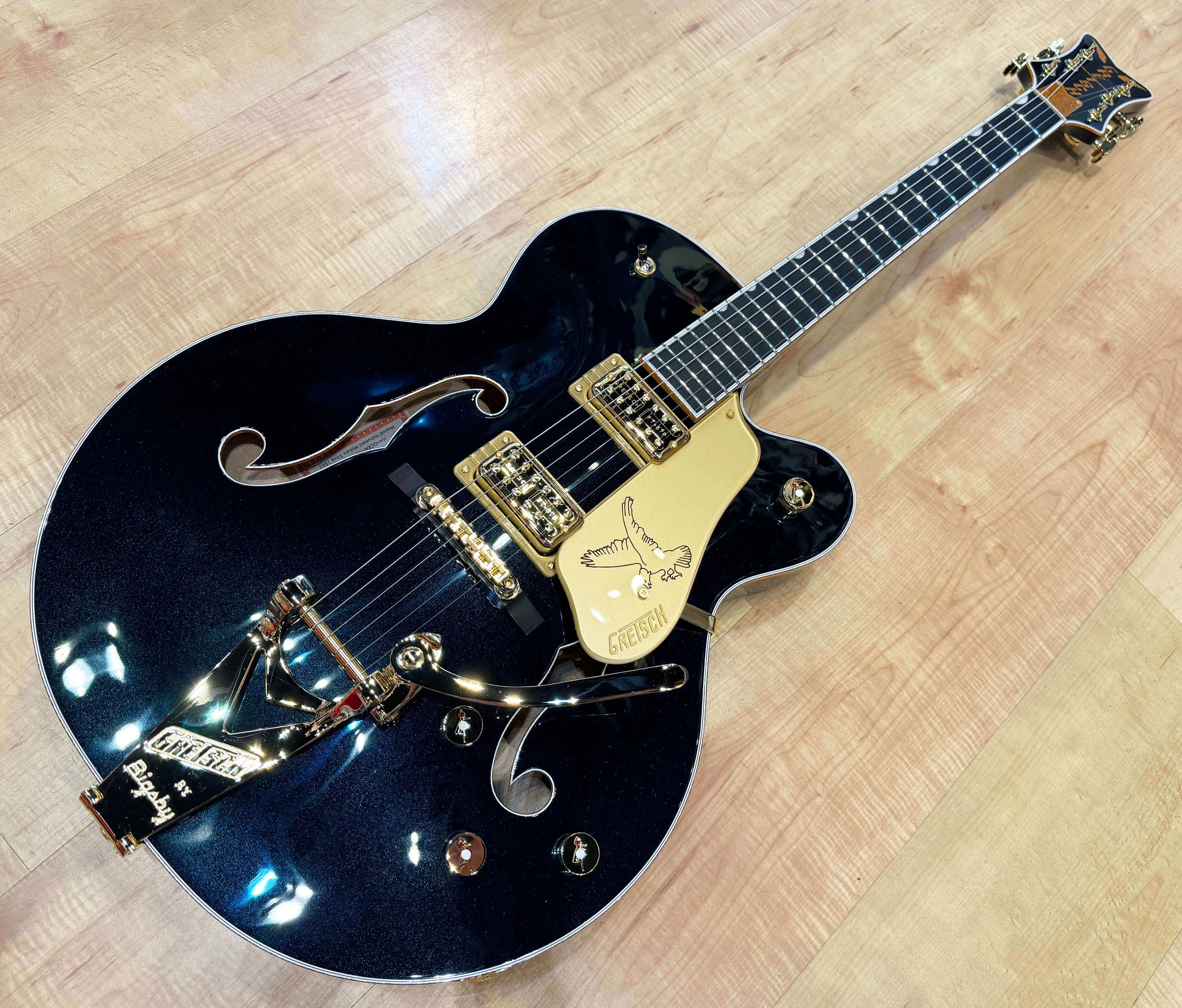 full view of the Gretsch G6136TG Players Edition Falcon Hollow Body with String-Thru Bigsby In Midnight Sapphire (Dark Blue)