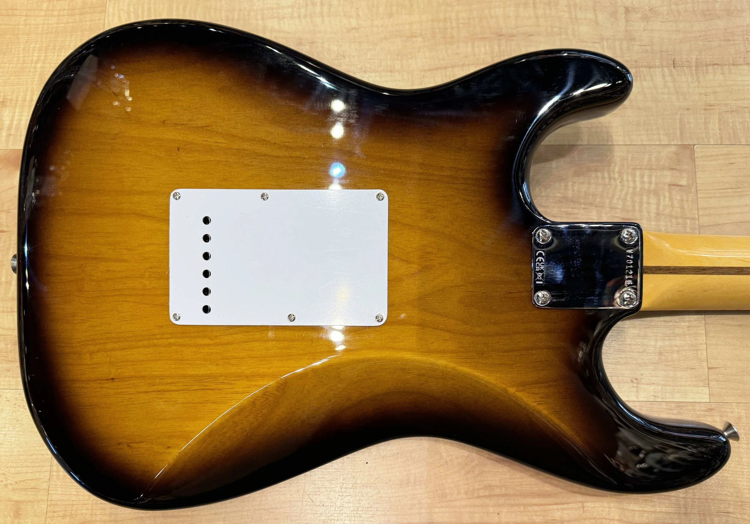 Back of the Fender 70th Anniversary American Vintage II 1954 Stratocaster Electric Guitar in 2-Color Sunburst with the Serial Number V701216