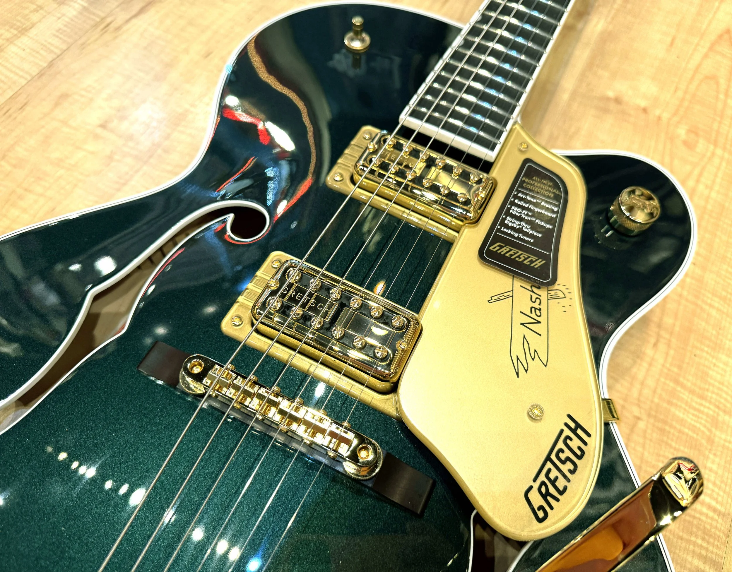 Pickups of the Gretsch 6120 Nashville Hollow Body with String-Thru Bigsby and Gold Hardware In Cadillac Green