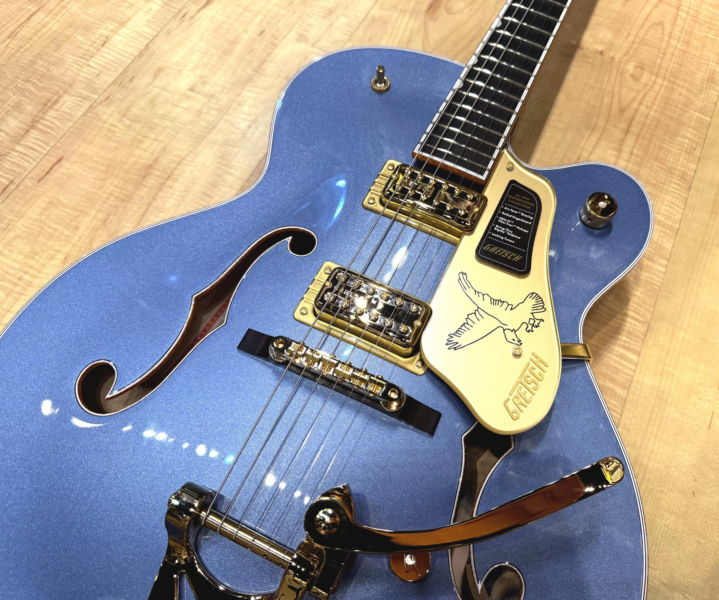 Bridge of the Gretsch Falcon Hollow Body Single-Cut Guitar with String-Thru Bigsby and Gold Hardware Cerulean Smoke Blue
