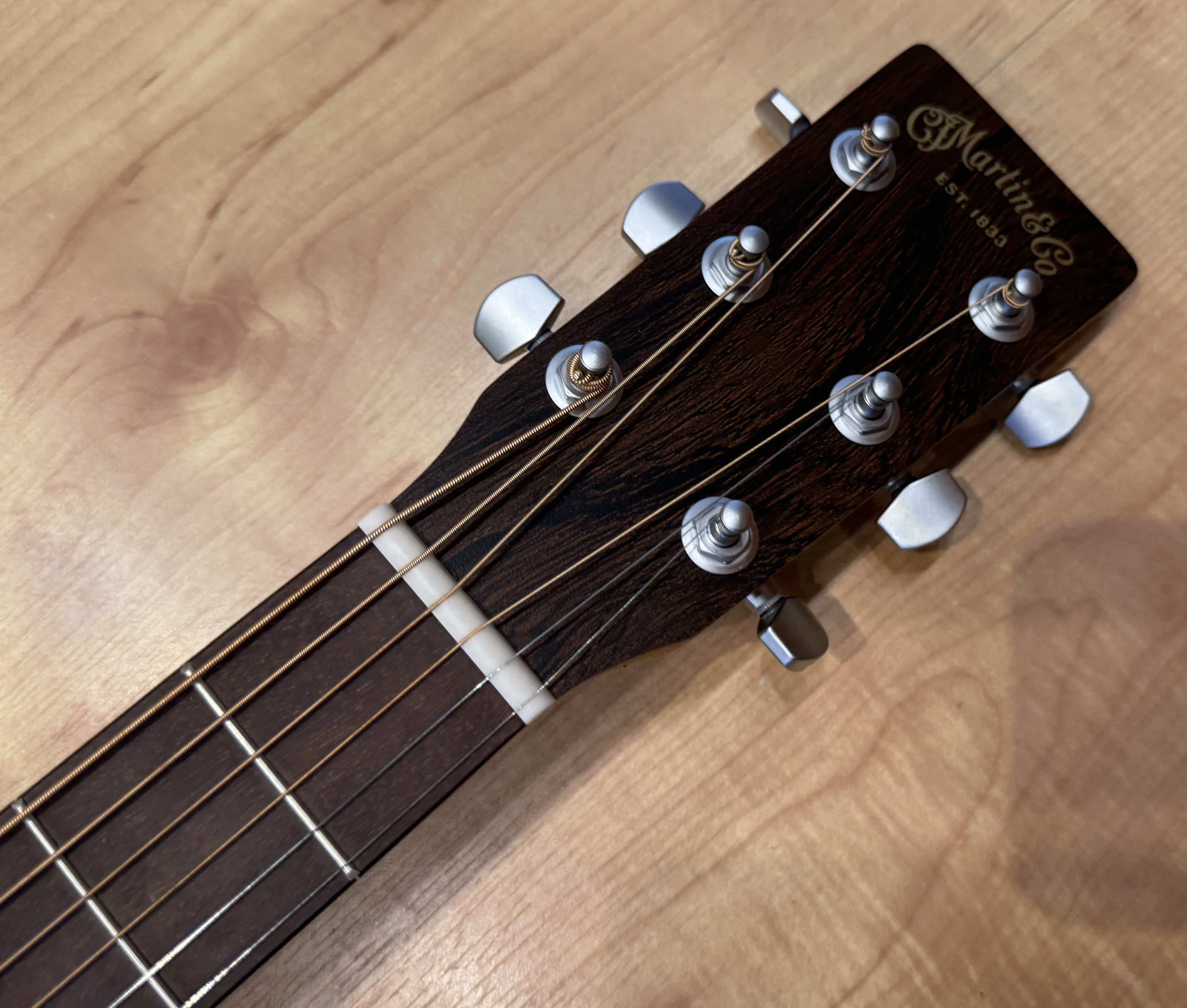 Headstock of the Martin X Series 000-X2E Brazilian Acoustic Electric Guitar