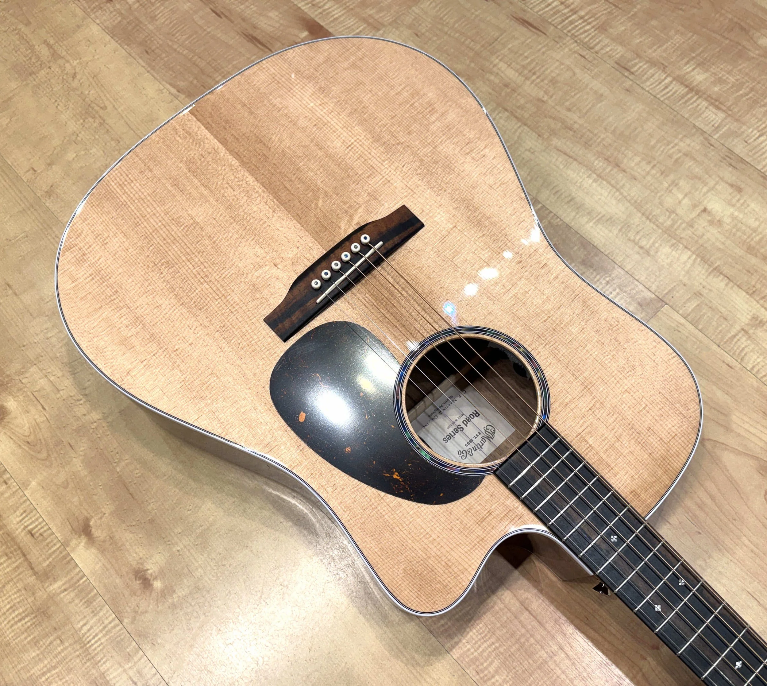 Pickguard of the Martin Road Series DC-13E Modern Cutaway Dreadnought Acoustic-Electric Guitar