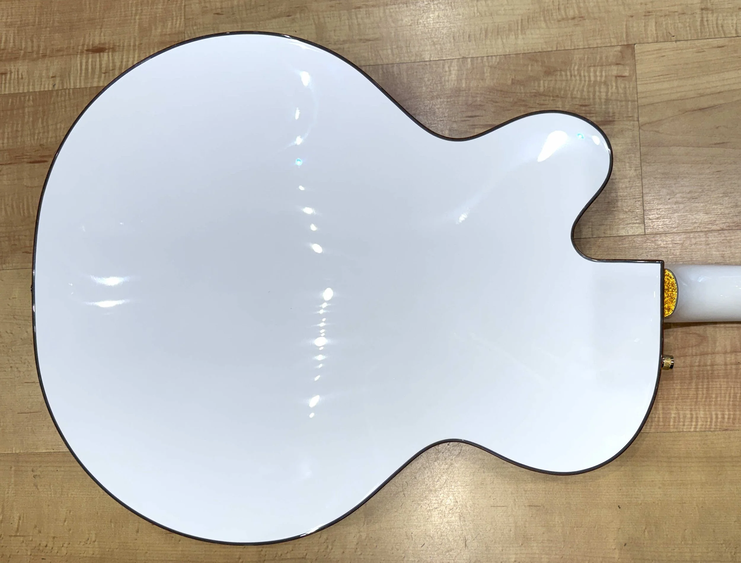Back of the body of the Gretsch Synchromatic Falcon Hollow Body Single-Cut Electric Guitar with Bigsby (White)