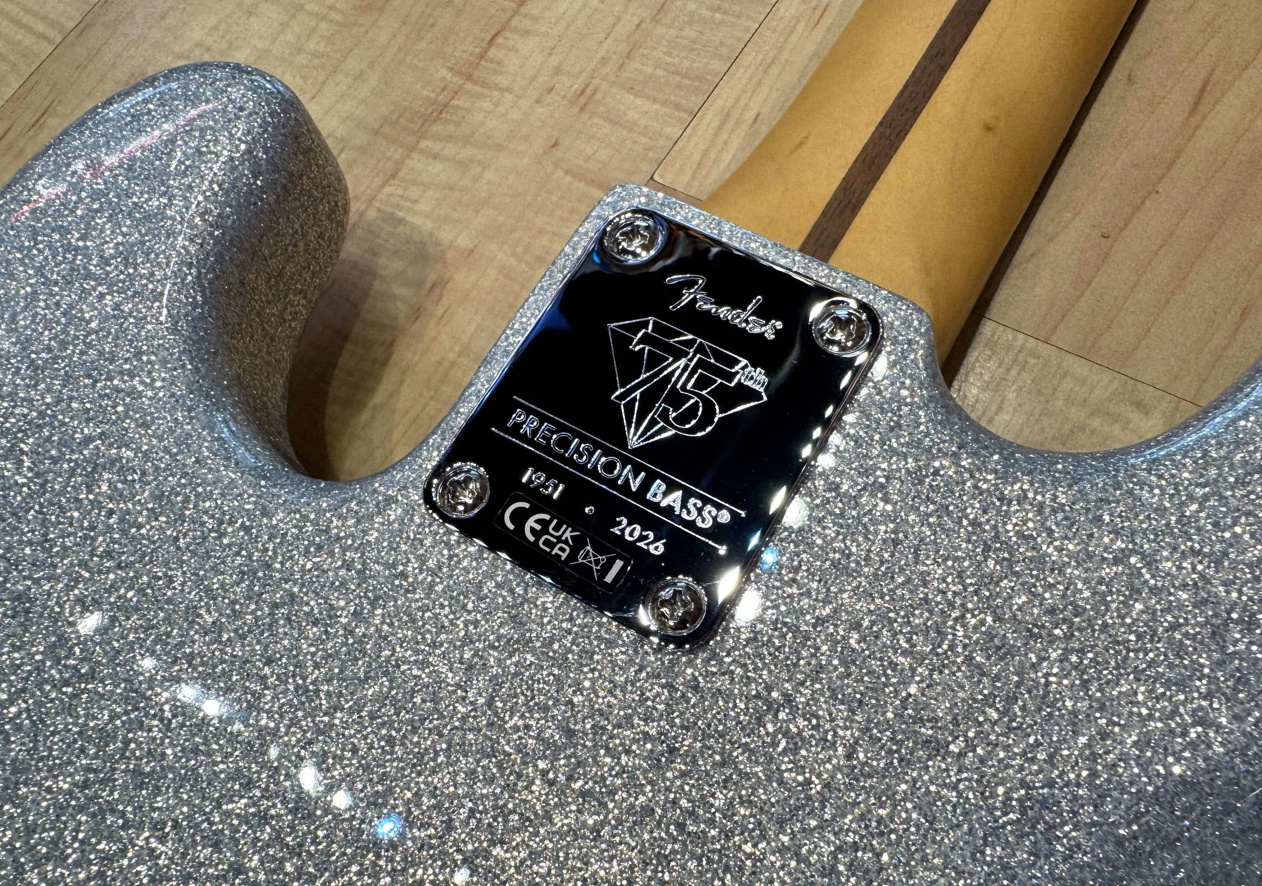 Neckplate of the Fender Limited Edition 75th Anniversary Player II Precision Bass In Diamond Dust Sparkle