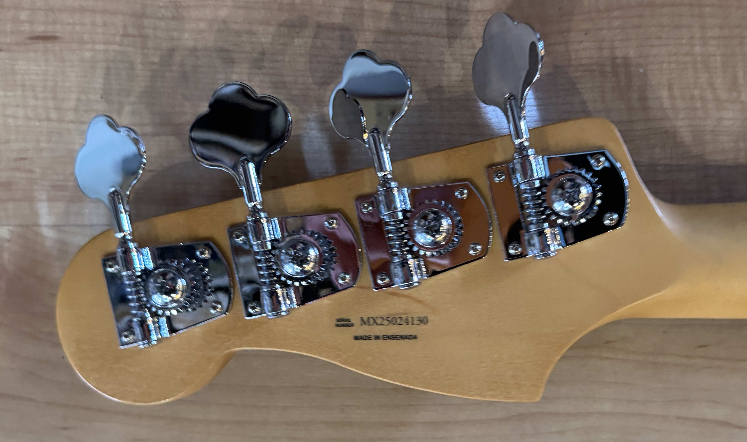Tuners of the Fender Player II Precision Bass in Coral Red