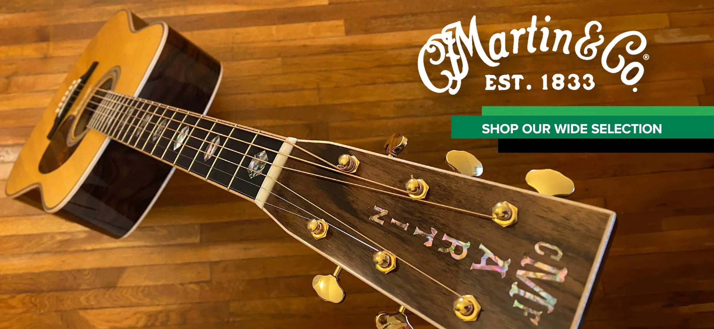 This image shows a martin guitar and advertises the wide selection Fab gear has