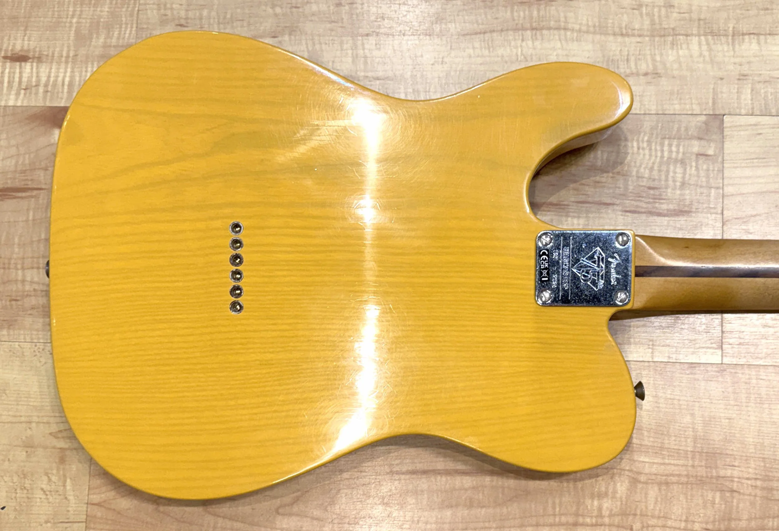 Back of the body of the Fender 75th Anniversary Vintera Road Worn 1951 Telecaster In Butterscotch Blonde