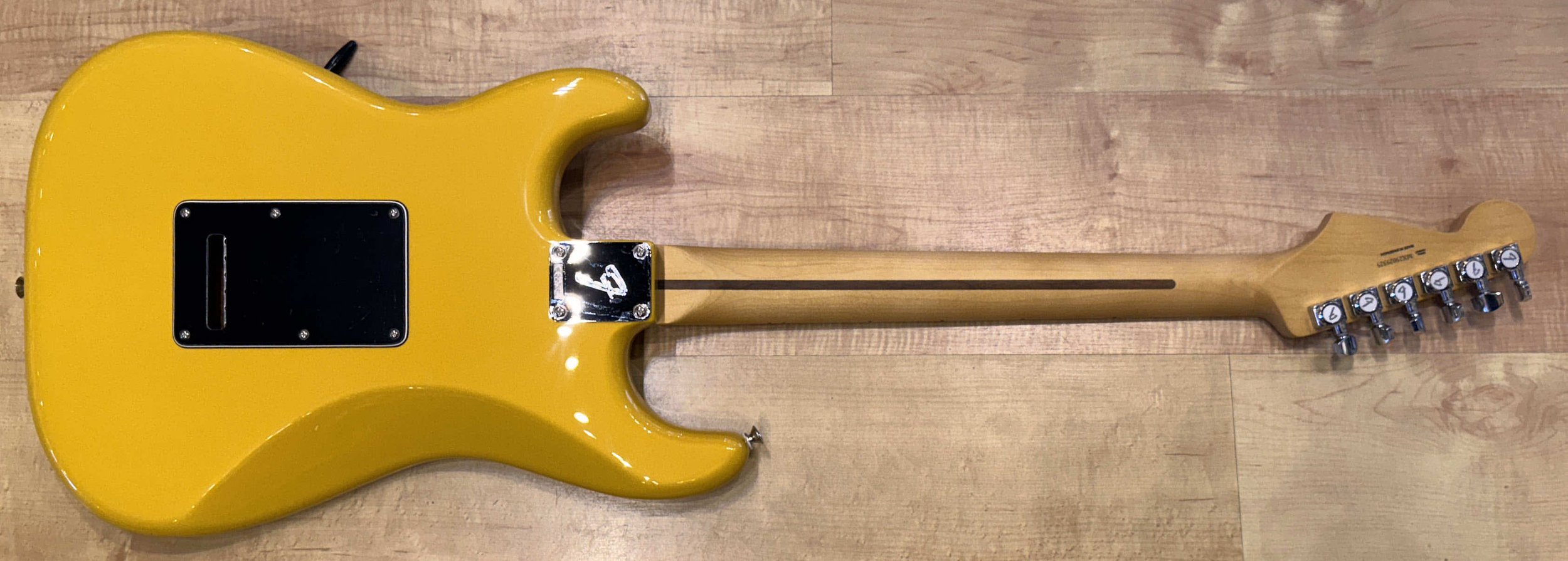 Back of the Fender Player II Modified Stratocaster Electric Guitar In Sunshine Yellow