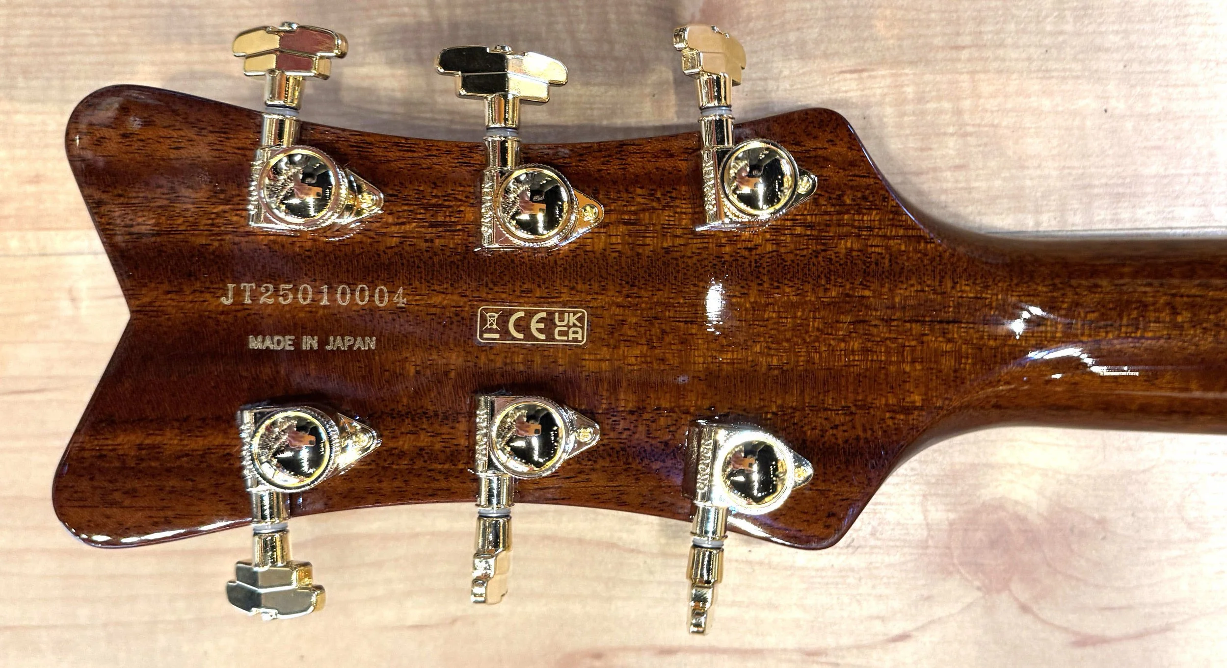 Tuners of the Gretsch Limited Edition Falcon Center Block Jr. with Bigsby Quilted Maple Top In Roundup Orange