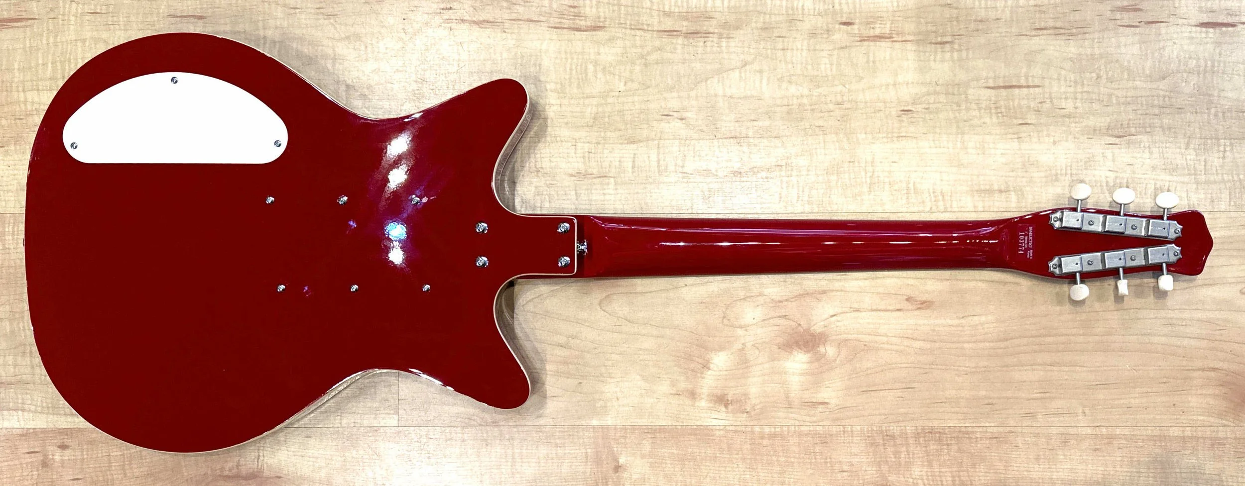 Back of the Danelectro '59 Triple Divine Semi-Hollow Electric Guitar In Red