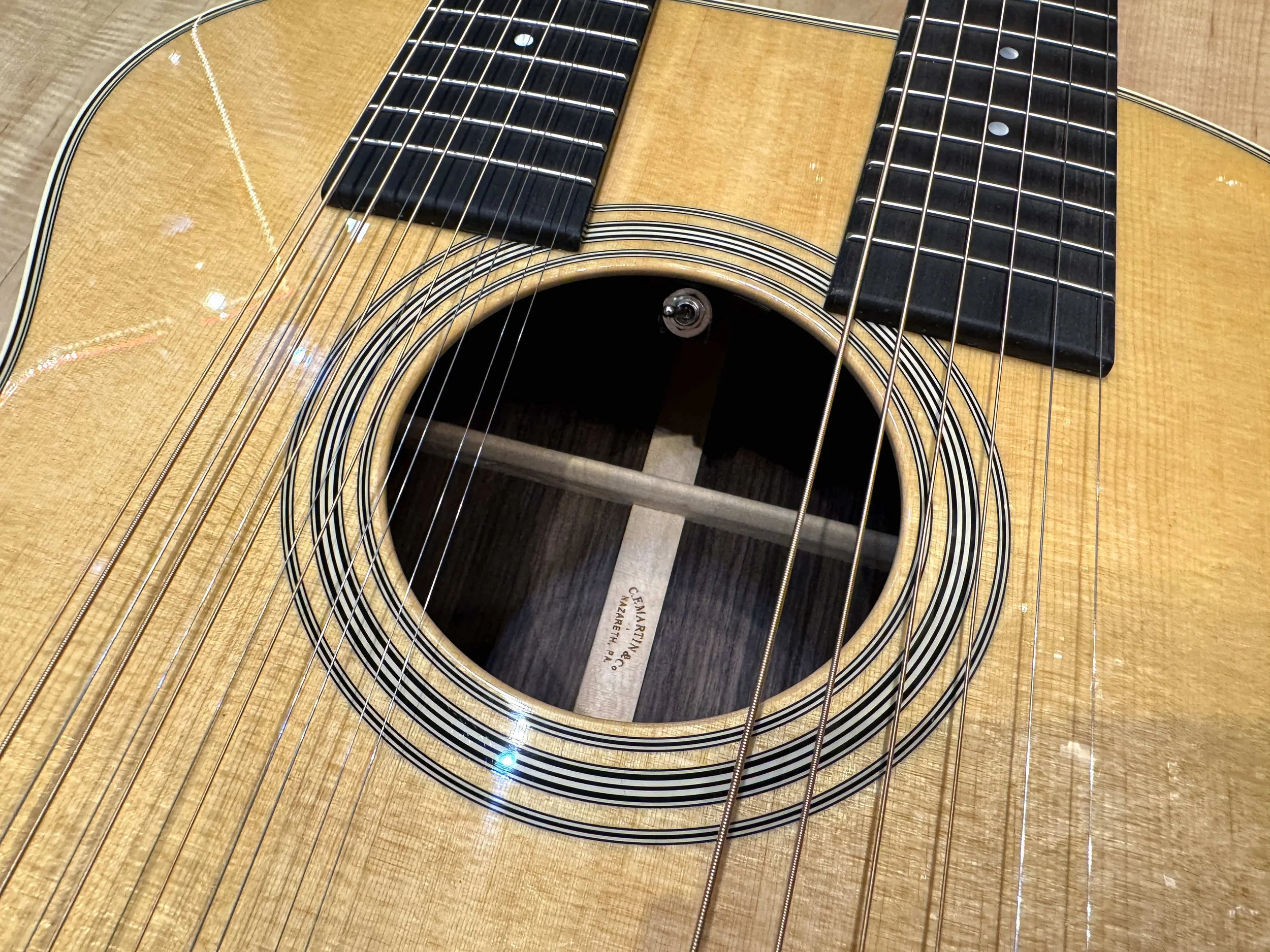 Soundhole of the Martin Grand J-28E DN 12-String and 6-String Double Neck Acoustic Electric Guitar