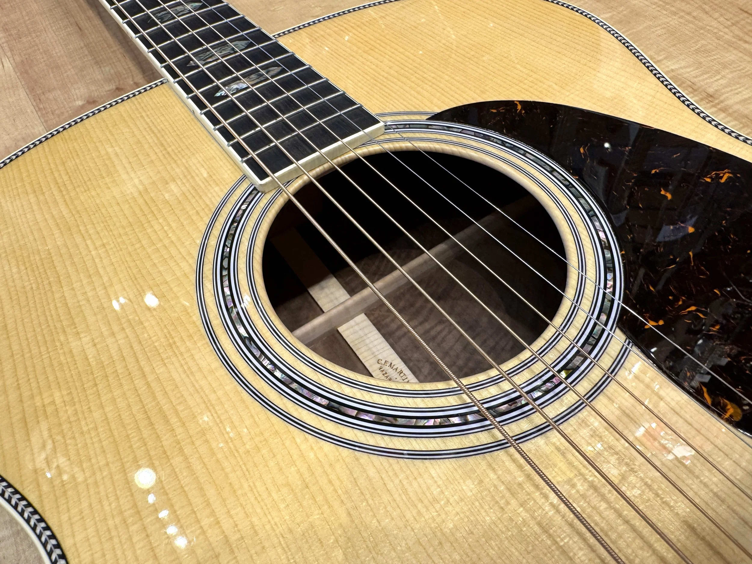 Soundhole of the Martin Custom Shop Grand Jumbo Style Acoustic Guitar with Bastogne Walnut Set #3