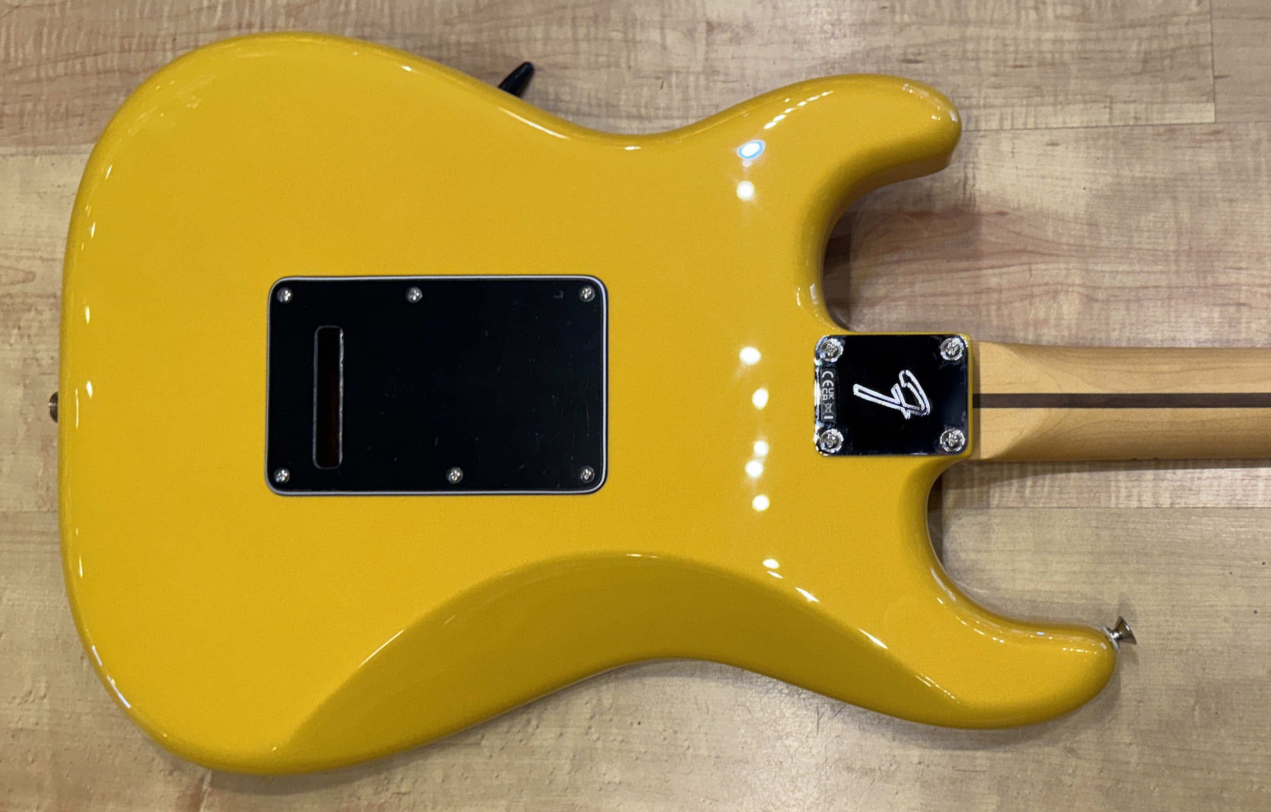 Back of the body of the Fender Player II Modified Stratocaster Electric Guitar In Sunshine Yellow