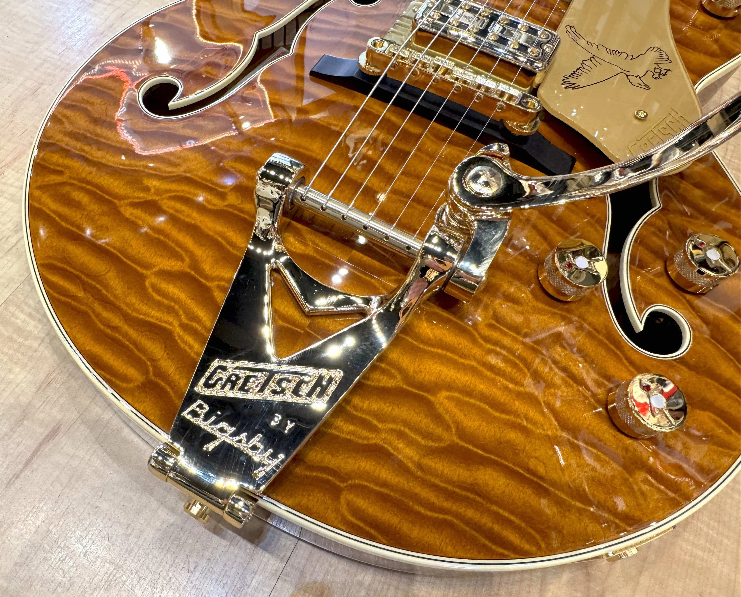 Bigsby Tailpiece of the Gretsch Limited Edition Falcon Center Block Jr. with Bigsby Quilted Maple Top In Roundup Orange