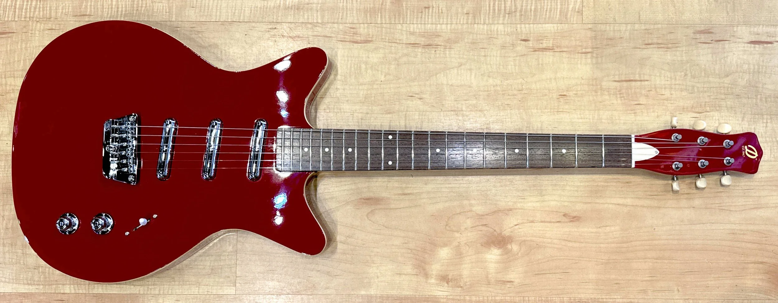 Front of the Danelectro '59 Triple Divine Semi-Hollow Electric Guitar In Red