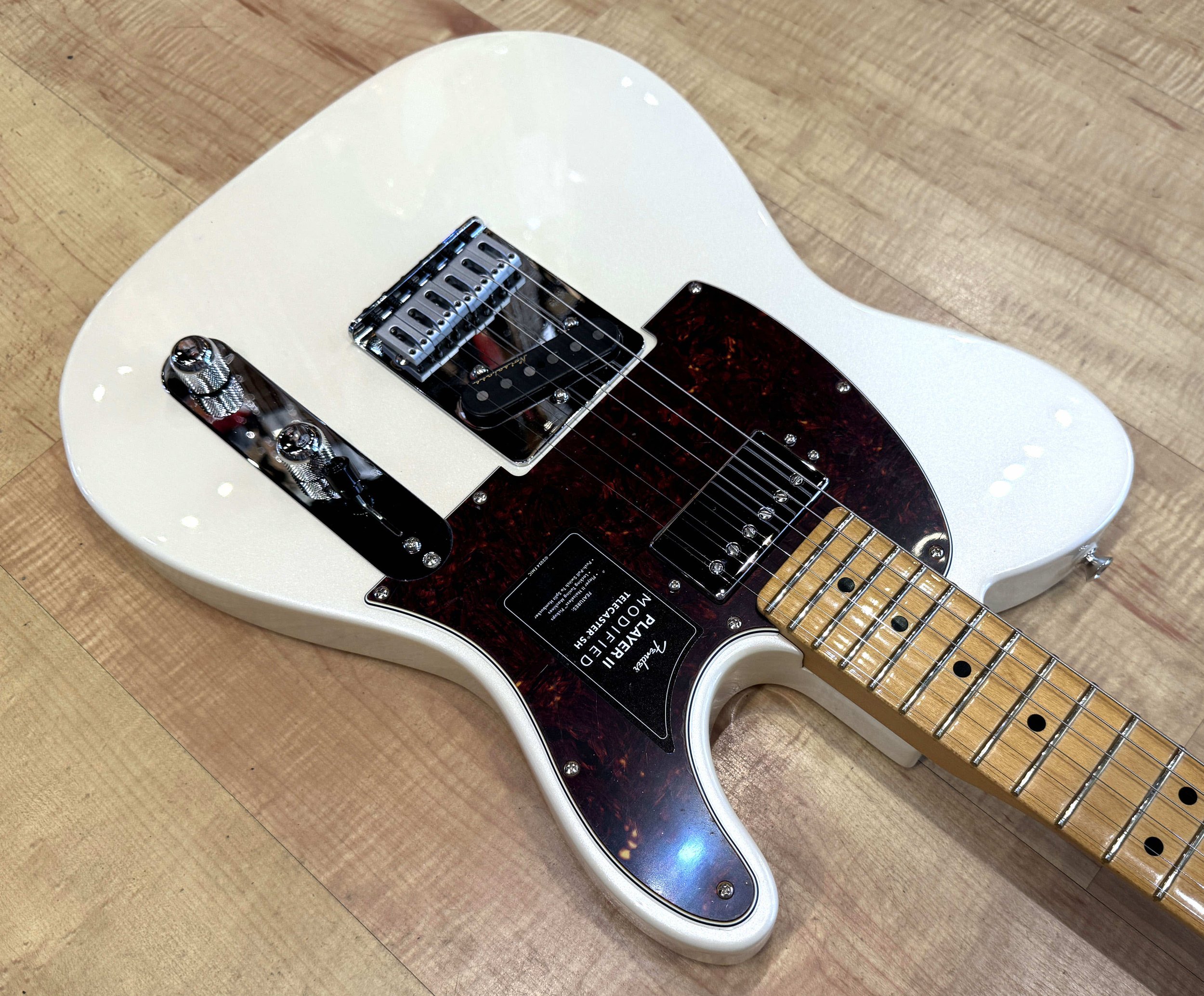 Pickguard of the Fender Player II Modified Telecaster SH Electric Guitar in Olympic Pearl White