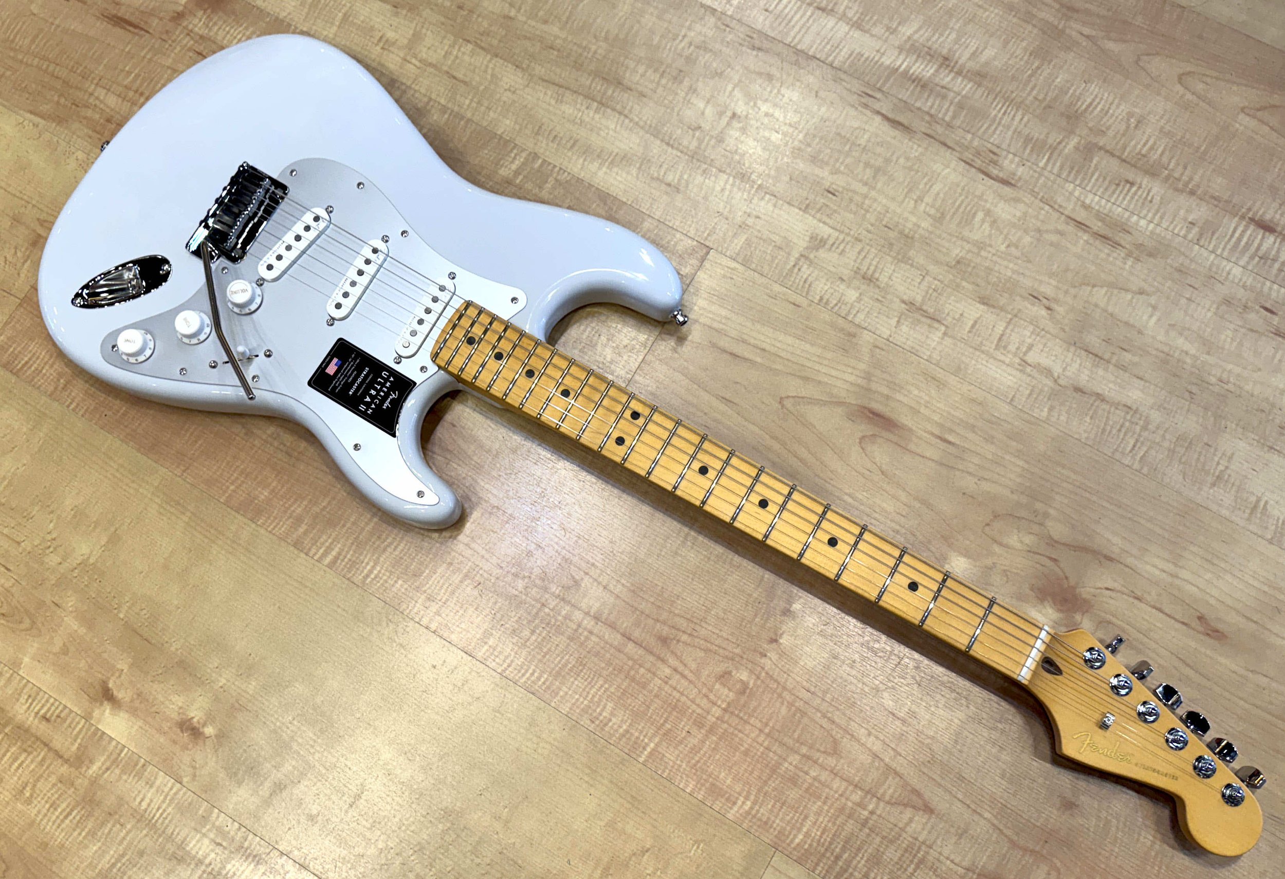 Neck of the Fender American Ultra II Stratocaster Electric Guitar In Avalanche White