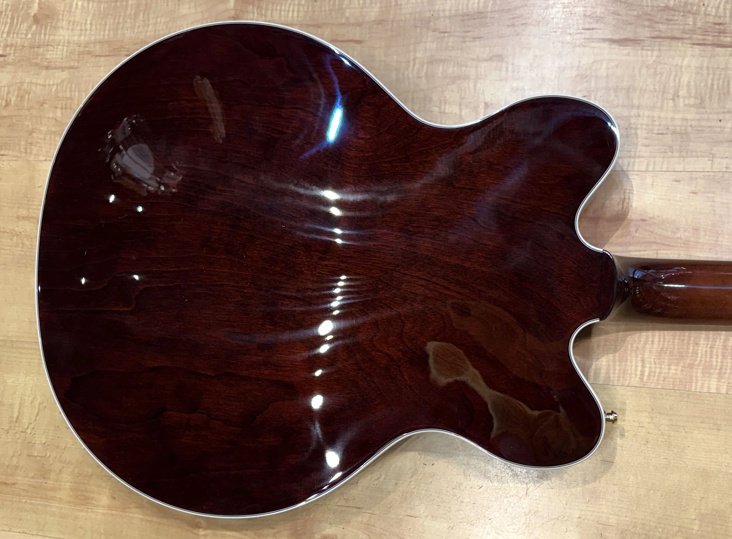 Back of the body of the Gretsch Limited Edition Abbey Road Studiomatic Hollow Body Guitar with Bigsby In Classic Walnut Stain