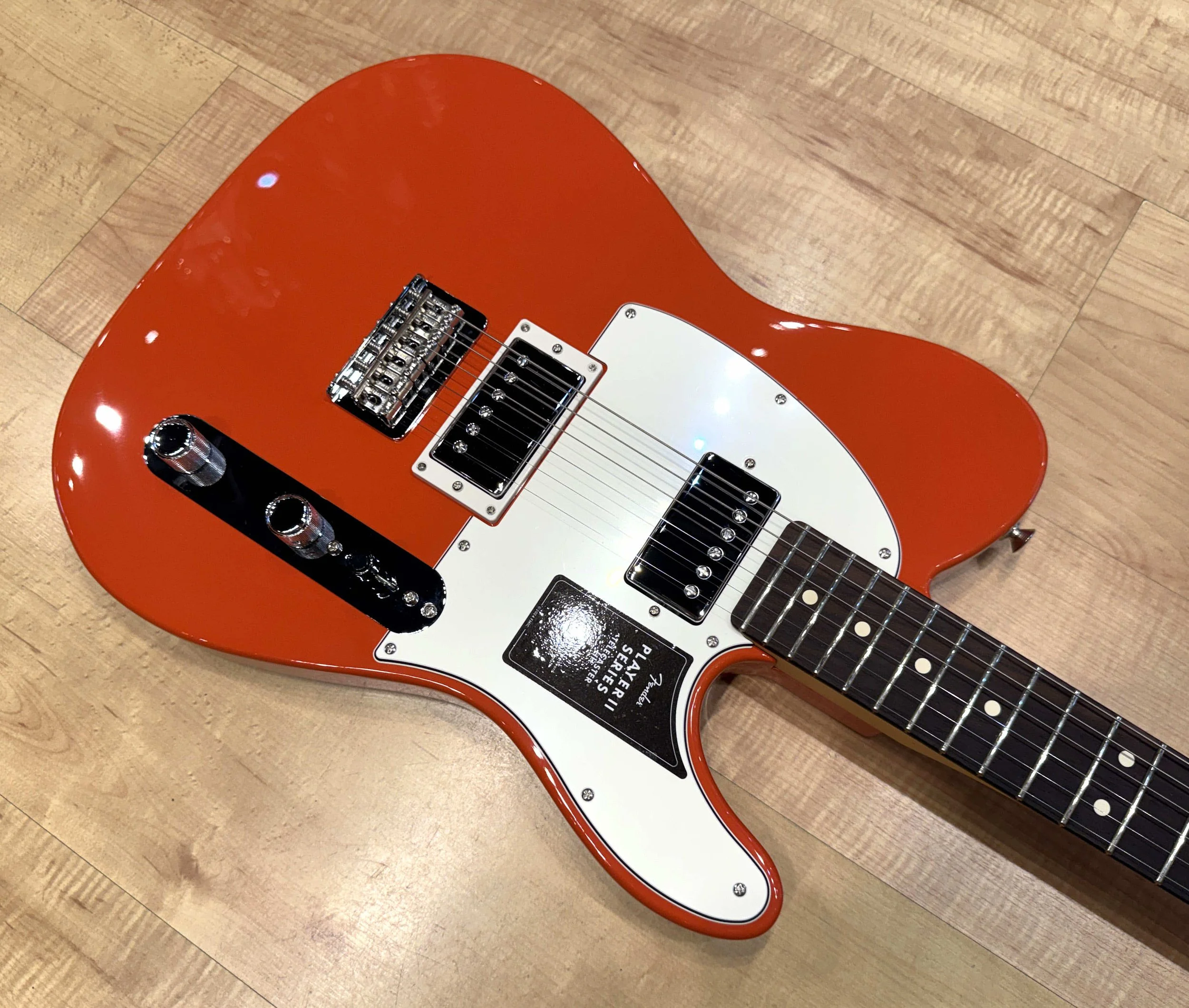 Pickguard of the Fender Player II Telecaster HH Electric Guitar In Rallye Orange