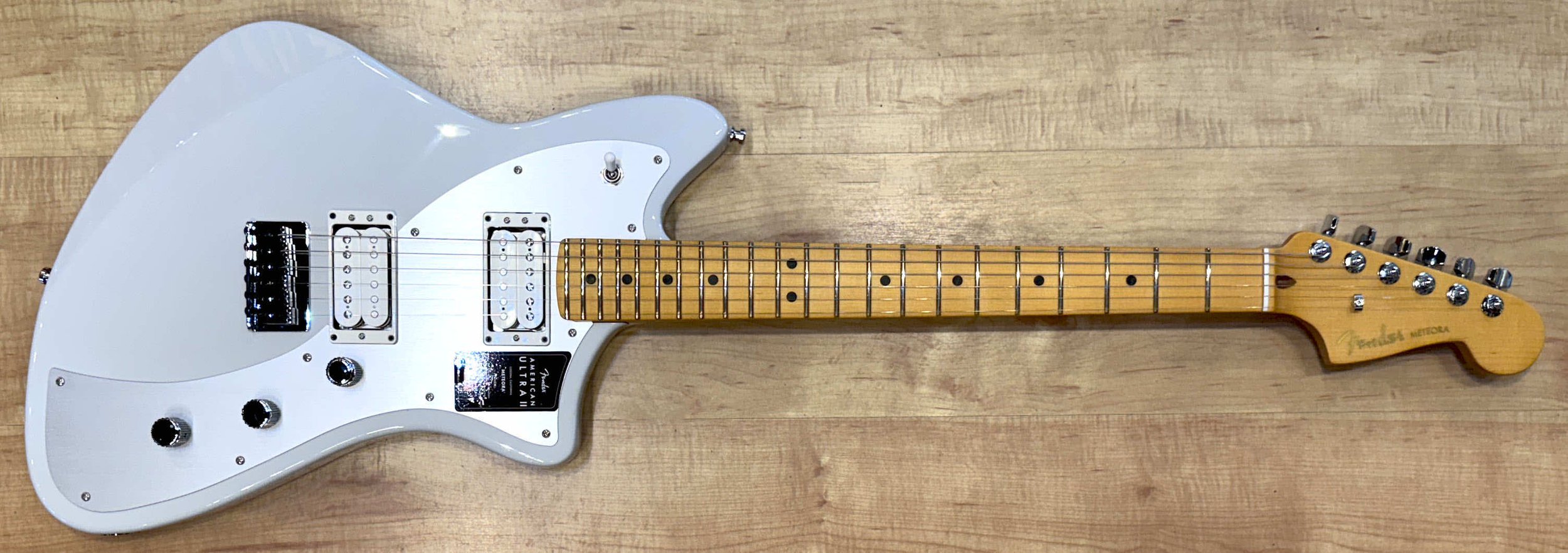 Front of the Fender American Ultra II Meteora Electric Guitar In Avalanche White