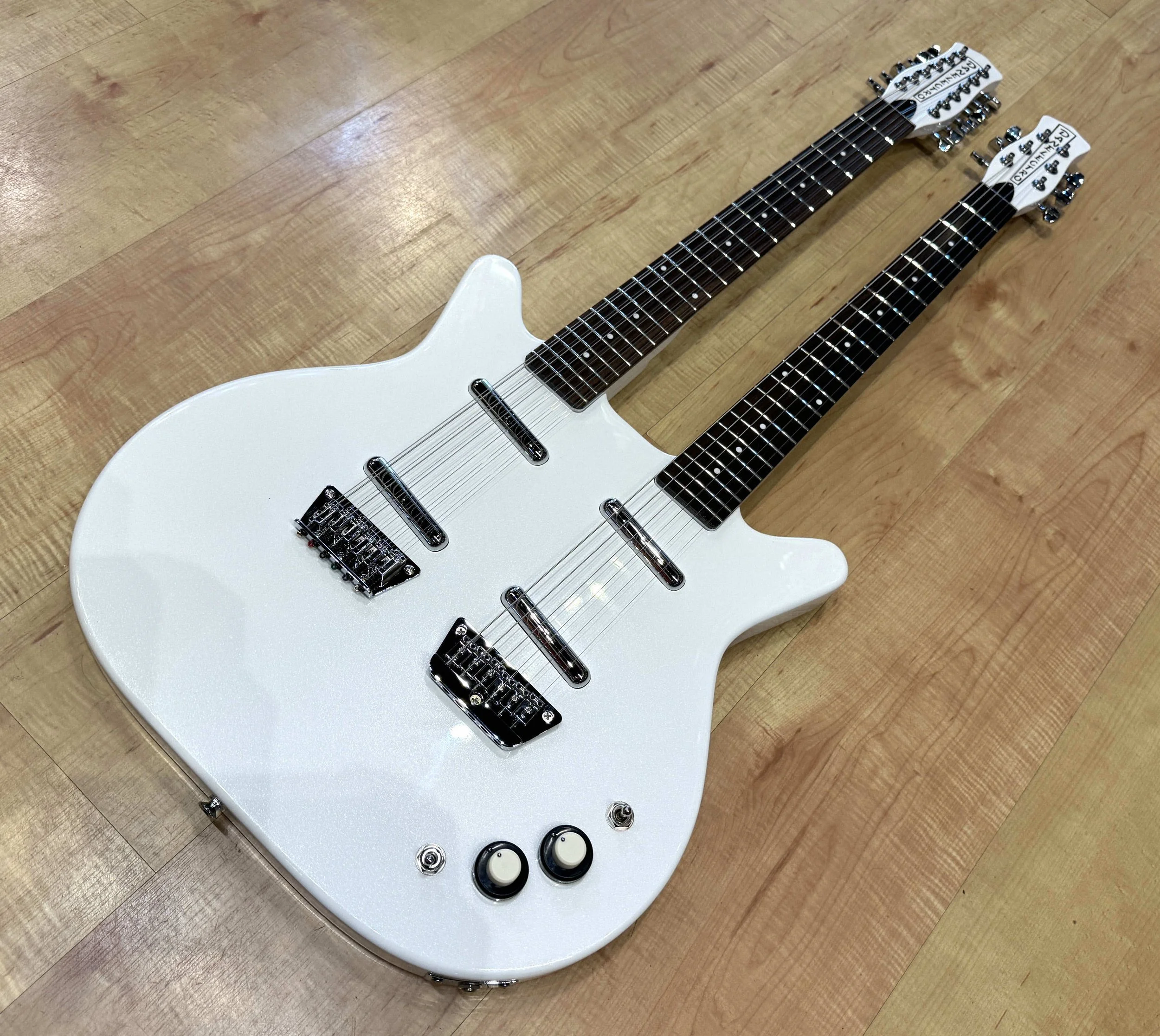 Full view of the Danelectro Doubleneck 6/12 Electric Guitar In White Pearl